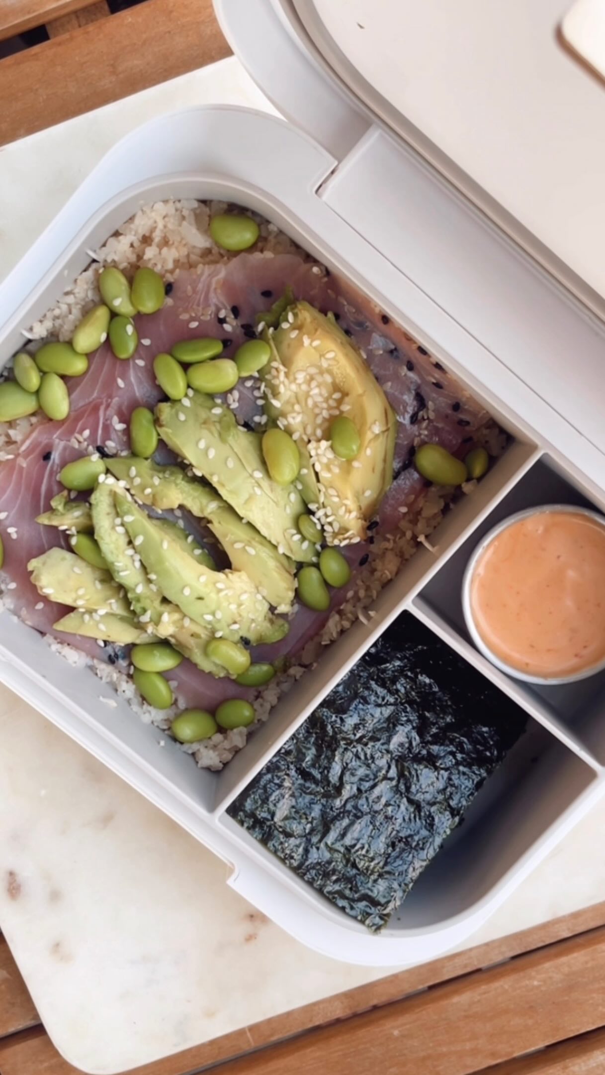 ✨SUSHI BENTO BOX✨high-protein & low-carb recipe below👇🏼
All the sushi flavors, without actually having to make sushi 💁🏼♀️
I used cauliflower rice as the base instead of regular sushi rice but with all the incredible flavors (don’t skip the lemon juice!), you honestly don’t even notice it’s cauliflower rice.
Everything in this little bento came from my weekly @hungryroot box! Use code CONTEKETO for 40% off Hungryroot if you want to try it 📦
INGREDIENTS:
- @kitchenandlovefoods Riced Cauliflower
- @acmesmokedfish Sesame Crusted Smoked Ahi Tuna
- half of an avocado, sliced
- fresh lemon juice
- @melissasproduce Edamame
- sesame seeds
- @fabalishfoods Organic Mayo
- @melindasfoods Sriracha
- @gimmeseaweed Roasted Seaweed Snacks
- you can also add soy sauce, chives, cream cheese or whatever sushi inspired flavor your heart desires
DIRECTIONS:
1) Start by filling the largest section of your bento box with cauliflower rice. Add the ahi tuna right on top.
2) Add sliced avocado, then squeeze fresh lemon juice over everything. Sprinkle with edamame and sesame seeds.
3) Next, mix mayo and sriracha in a small dipping cup to make your spicy mayo. Add the spicy mayo to one section of the bento box and the seaweed sheets to the last section.
4) Grab a sheet of seaweed, spread on some spicy mayo, scoop up some of the ahi and cauliflower rice, then add it to the seaweed. Fold it up and take a bite. Enjoy!
Follow @conteketo for more easy recipes, shopping hauls, & product reviews! #ConteKeto #HungryRoot #HungryRootPartner #Keto #BentoBox
high protein lunch ideas, easy low carb lunch, ahi tuna recipe, keto meal prep, cauliflower rice recipe, easy keto recipe, keto meal prep, low carb meal prep, high protein meal prep, easy lunch recipes, healthy lunch ideas