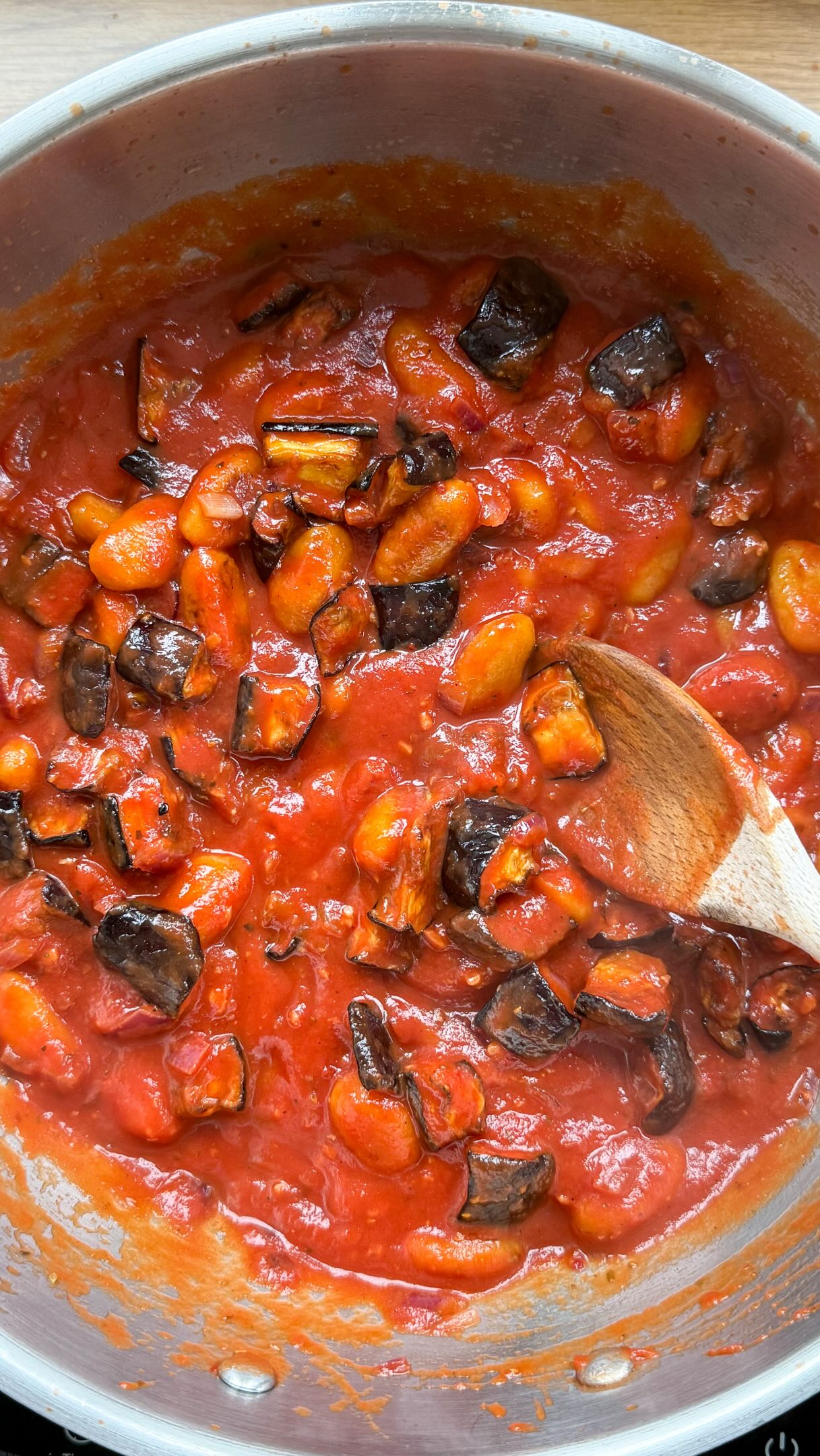 A simple Pasta alla Norma, with a Sunny & Luna twist 🍆
All the flavours of the classic Italian dish, with golden, crispy gnocchi taking centre stage. Rich, saucy and packed with vegetables - this might be your new go to weeknight dinner.
Aubergine & Tomato Gnocchi
Serves 2 | 20 minutes
You’ll need:
🍆 1 pack Sunny & Luna Pumpkin Gnocchi
🍆 2 aubergines, cut into cubes
🍆 1 red onion, diced
🍆 2 garlic cloves, minced
🍆 1 x 400g jar passata
🍆 1 tbsp tomato purée
🍆 ½ tsp chilli flakes
🍆 1 tsp dried oregano
🍆 Small handful of fresh basil
🍆 Parmesan, to serve
🍆 Olive oil
🍆 Salt and pepper
Method:
👉 Toss the aubergine with olive oil, salt and pepper. Air-fry at 205°C for 12-15 minutes, until completely soft and golden.
👉 Heat a tablespoon of olive oil in a pan and cook the gnocchi for 5-6 minutes, turning regularly, until golden and crisp. Remove from the pan and set aside.
👉 Add the red onion to the pan and cook for a few minutes until softened, followed by the garlic. Stir in the tomato purée and chilli flakes, then cook for another minute.
👉 Pour in the passata. Fill up the jar to around 1/3 with of water and pour in. Add the oregano, pinch salt and pepper, then stir and leave to simmer for around 5 minutes until the sauce has thickened slightly.
👉 Gently stir through the roasted aubergine and crispy gnocchi until everything is coated in the sauce, simmer for a further few minutes adding a splash more water if needed.
👉 Serve immediately with plenty of fresh basil, grated Parmesan and black pepper.