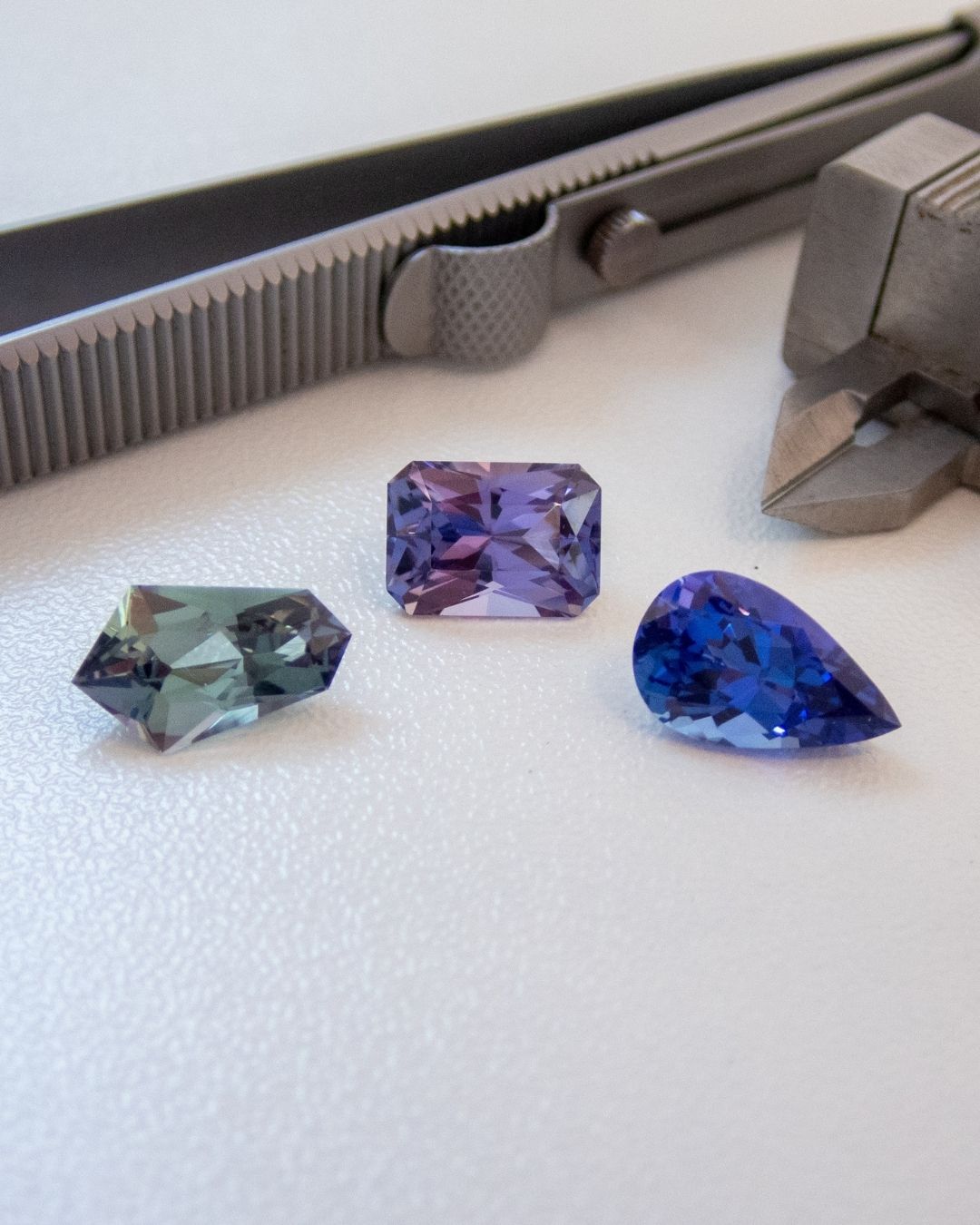Tanzanite is the blue violet variety of the mineral zoisite, but zoisite itself can occur in a much broader range of colours. Side by side these three stones show just how varied zoisite can be, and why not every piece of zoisite is necessarily called tanzanite.
The two stones on the left are unheated. The green stone is simply called zoisite, while the violet blue centre stone falls into the colour range we know as tanzanite.
The vivid blue stone on the right has been heated. Heating tanzanite typically reduces the yellow, green and brown colours that can be present in natural zoisite, allowing the blue and violet colours to dominate. But heating doesnβt simply turn every stone the same shade of blue, the starting material matters, so the finished colour can range from softer violet and periwinkle through to much richer blues π
#tatumgems #tanzanite #zoisite