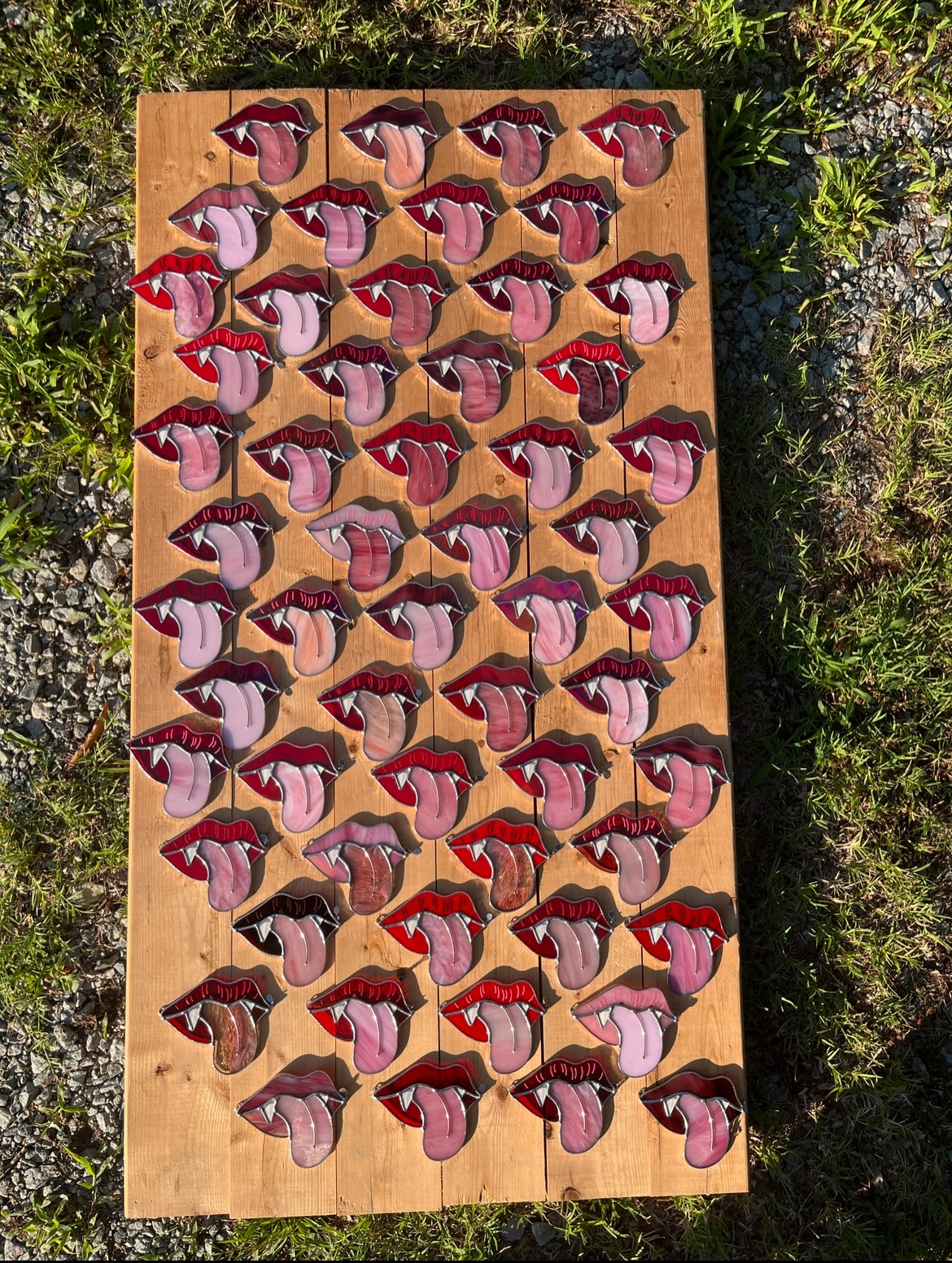 Some more shots of our vampire mouths for @sjtillyauthor ! I feel like these really capture just how many pieces this ended up being 😅 and yes, my 5’0” self did have to stand on a literal stepladder to get these. If you look closely, you might notice there’s actually 56 of these babies - we made one extra one for ourselves as a little souvenir 💋