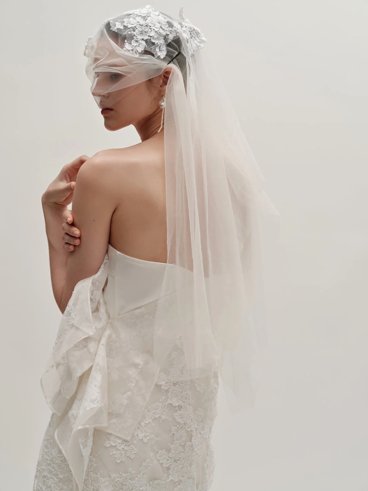 Here for modern. Here for different. Here for anything that isn’t just the bog standard bridal uniform. Veil and dress both available to try in store.