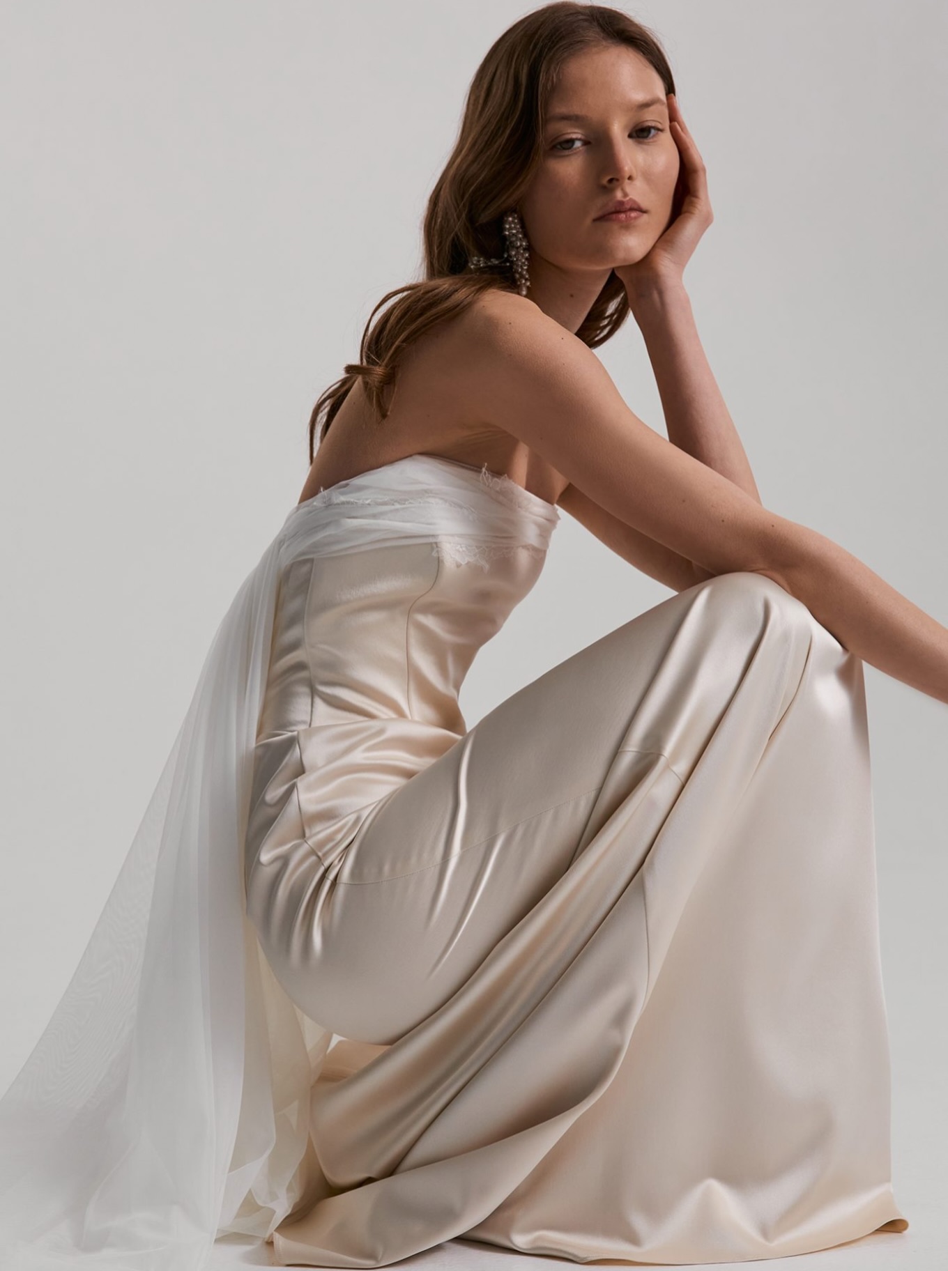 Ariadne. A sumptuous champagne coloured thick satin and delicate tulle lace Watteau train. Under 2k.