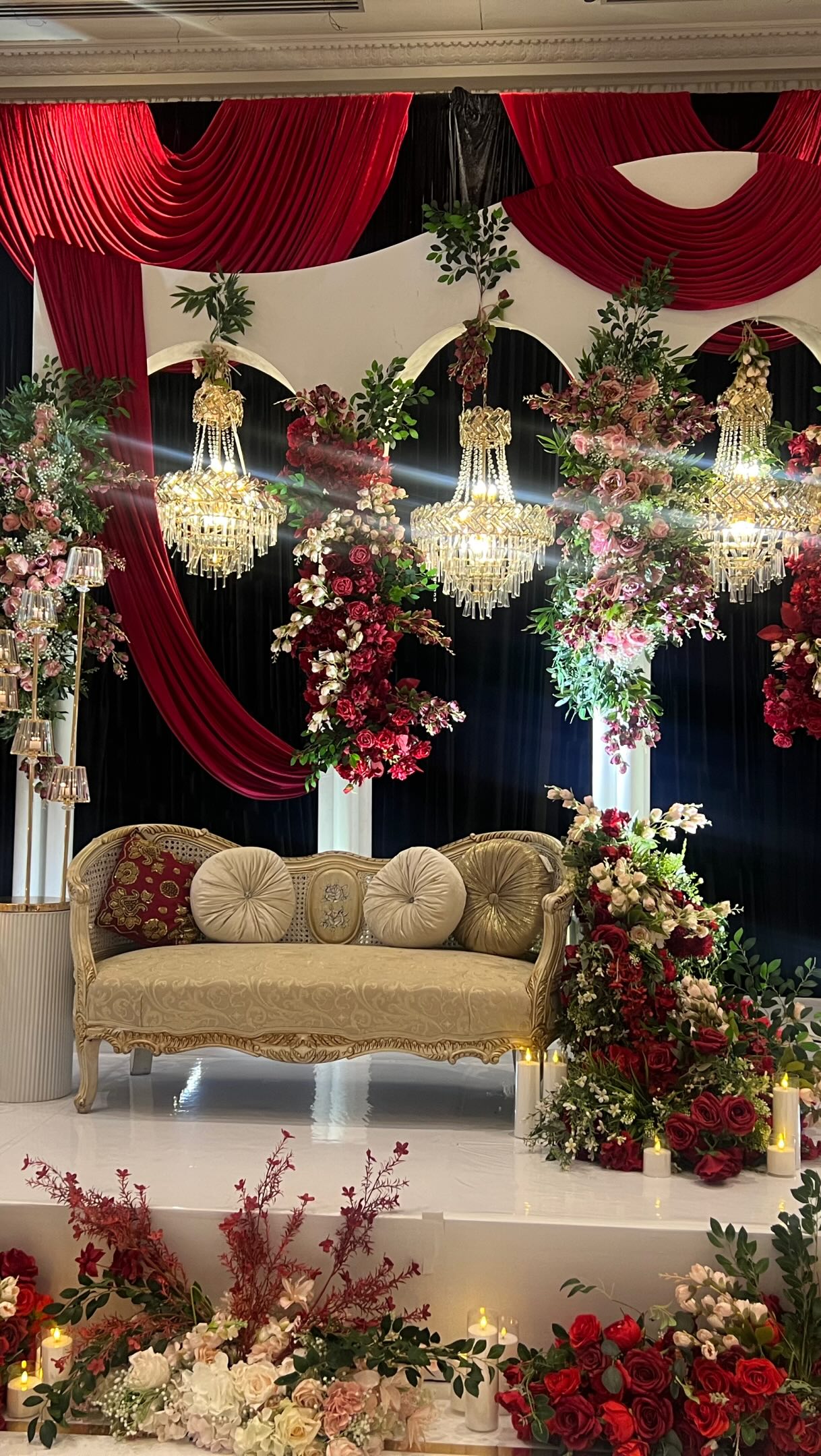 A dream brought to life for a bride who envisioned breathtaking red floral wedding 🌹
Rich red velvet drapery flowed effortlessly throughout the venue, creating an atmosphere of timeless romance and grandeur. The grand head table became a statement of its own, adorned with lush florals and elegant champagne candelabras that added a warm, luxurious glow.
Floral arrangements were thoughtfully placed throughout the space—framing the structures, cascading around the sofa, and surrounding the dance floor to create a seamless garden of blooms. At the heart of the celebration stood a stunning floral Nikah divider, becoming the focal point of the dance floor, while a dreamy walkway of dangling chandeliers illuminated the space.
And then came the bride’s grand entry—a moment designed to make her feel truly special, surrounded by flowers, candlelight, and the beauty she had always dreamed of.
Decor: @rubysdecor
Content creator: @momentsbyamz
Coordinator: @savethedateevent
Photo: @noazastudios
Dj: @bookdjnas | @djemporium
Video: @happysoulfilms
Makeup: @makeuphouz
Floorwrap: @star.wrapsdesigns
Dhol: @kanwaldholi
Photobooth: @1stopshopgta
#wedding #decor #red #gta #toronto