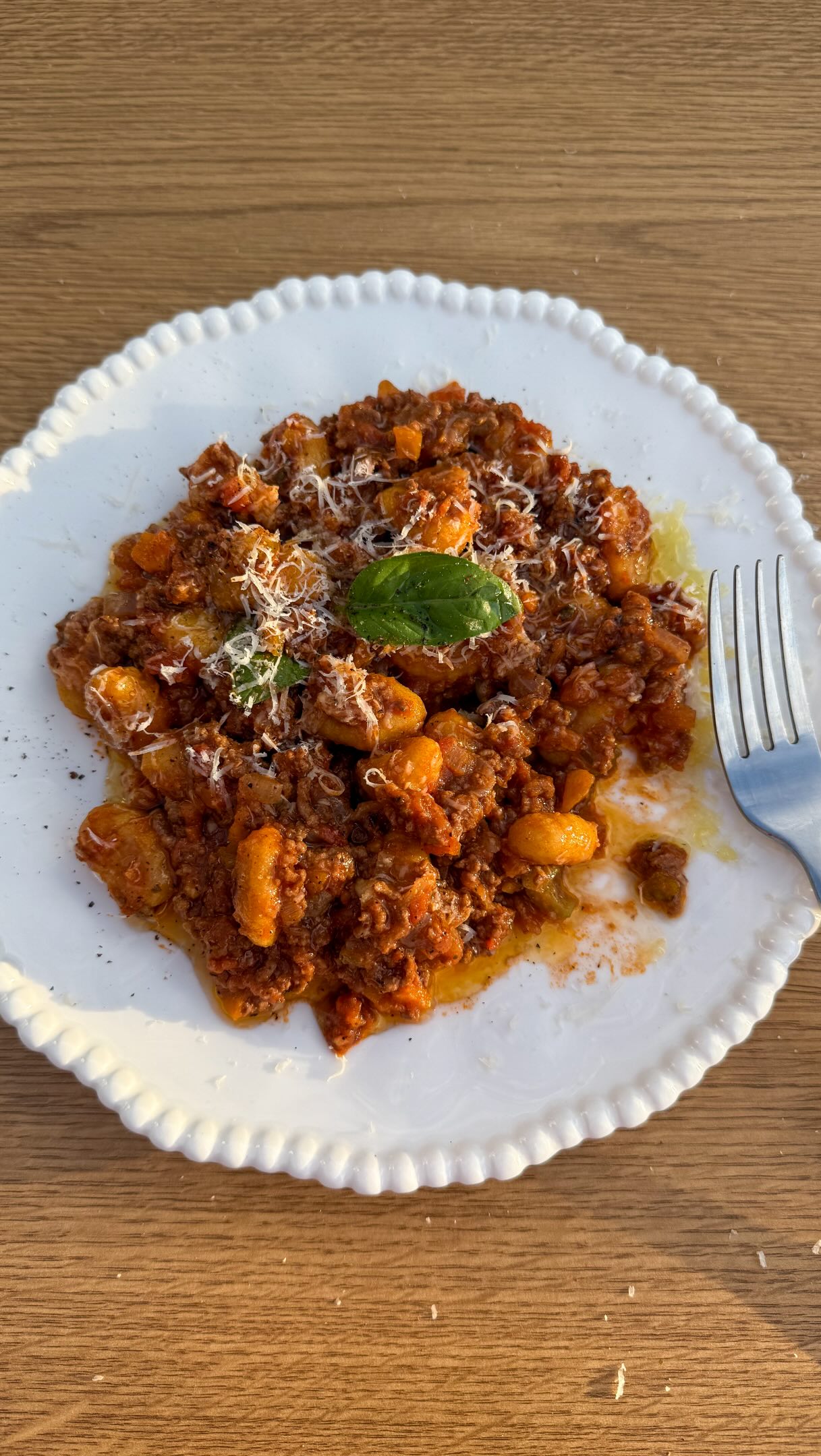 Your new favourite way to eat bolognese 🍅
A rich, hearty bolognese with golden gnocchi instead of spaghetti. Comforting, warming and delicious.
Make the full recipe for four, or serve what you need and save the remaining sauce for an easy dinner tomorrow - or freeze it for another cosy evening.
Gnocchi Bolognese
Makes 4 servings of sauce | 1 hour 30 minutes
You’ll need:
🍅 1-2 packs Sunny & Luna Pumpkin Gnocchi
🍅 500g mince
🍅 2 onions, finely diced
🍅 2 carrots, finely diced
🍅 2 celery sticks, finely diced
🍅 2 garlic cloves, finely chopped
🍅 2 sprigs fresh rosemary, finely chopped
🍅 2 x 400g tins finely chopped tomatoes - we used @ciriouk
🍅 2 tbsp tomato purée
🍅 100ml red wine
🍅 1 beef stock cube
🍅 1 tbsp dried oregano
🍅 2 bay leaves
🍅 Olive oil
🍅 Salt and pepper
🍅 Parmesan and fresh basil, to serve
Method:
👉 Heat a tablespoon of olive oil in a large, deep pan. Add the onions, carrots, celery, garlic and rosemary, then cook gently for around 10 minutes until softened.
👉 Add the mince and cook until browned. Stir in the tomato purée and cook for a couple of minutes, then pour in the red wine and allow it to cook off for around 5 minutes, or until evaporated.
👉 Add the chopped tomatoes, oregano, bay leaves, and stock cube. Fill up an empty tomato can with water to half way, and pour in. Bring to the boil, then reduce the heat, cover and simmer gently for at least 1 hour. When ready to serve,
👉 When the bolognese is nearly ready, remove the bay leaves and season to taste. Heat a little olive oil in a separate pan and cook the gnocchi for 5-6 minutes, turning regularly, until golden and crispy.
👉 If serving two, stir half the bolognese through one pack of gnocchi and save or freeze the remaining sauce. If serving four, stir the full batch through two packs of gnocchi. Cook over a low heat for another 5 minutes, adding a splash of water if needed.
👉 Serve immediately with plenty of grated Parmesan and enjoy!