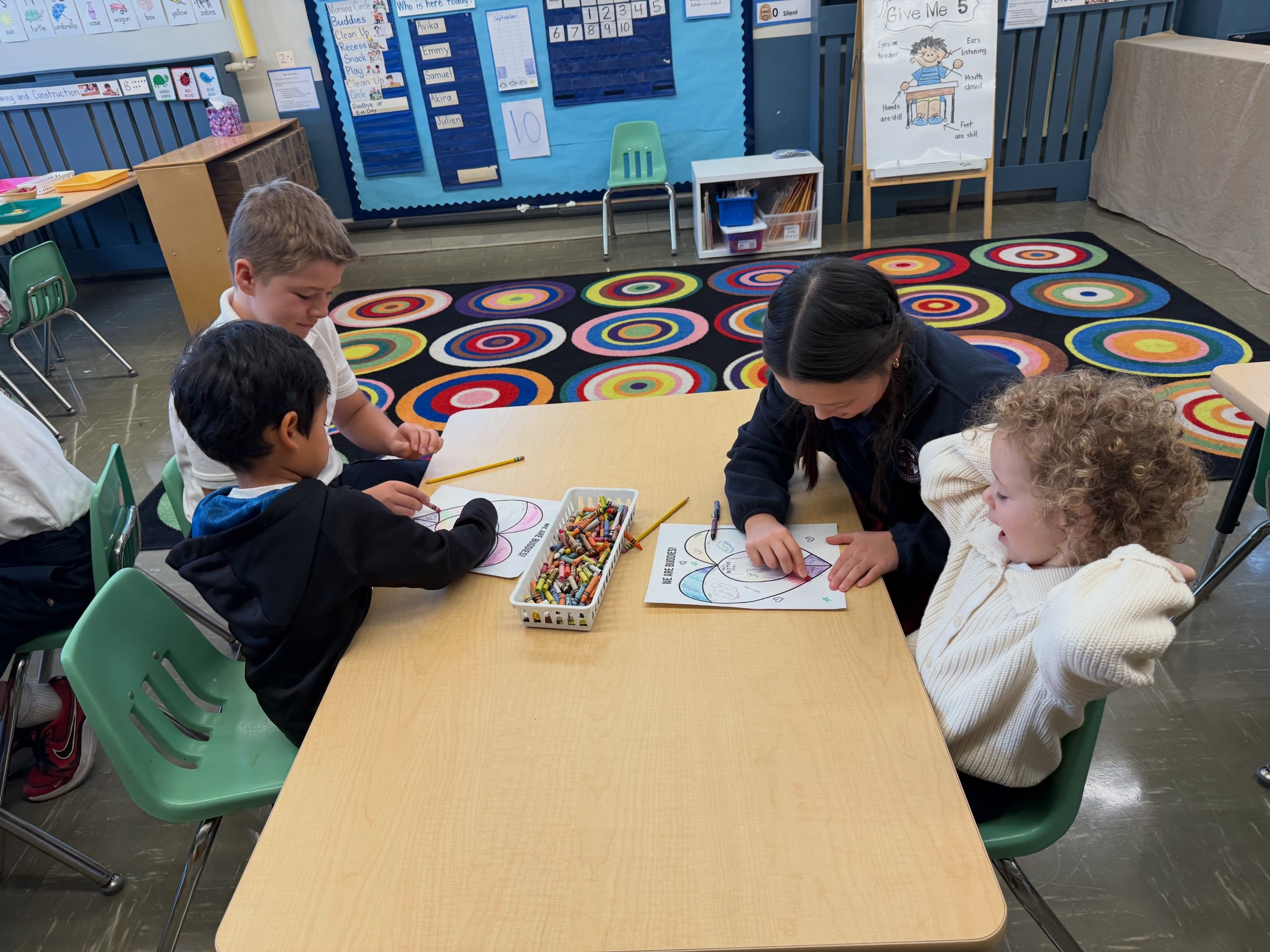 Last week kicked off our very first Buddy Activity of the year! Watching the big kids gently guide, listen, and learn right alongside their little buddies is truly one of the most adorable things to witness. From discovering favorite things to finding out what they have in common, this first meetup was all about breaking the ice. Our twice a month buddy activity is the heartbeat of our school, giving the older kids a chance to lead with kindness and giving the little ones a familiar, friendly face to look up to. They’re already counting down the days until they can reunite and have fun again!