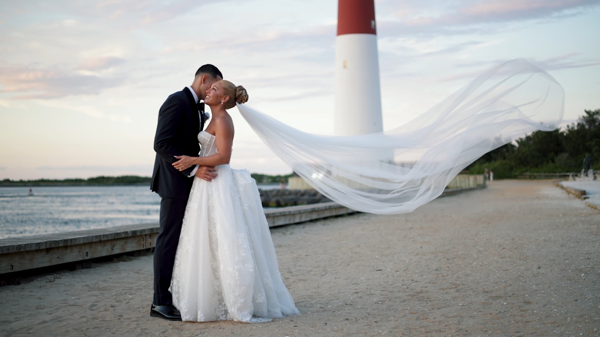 Anna and Dylan celebrated their beautiful Long Beach Island wedding day at Daymark LBI.
The day began at Hotel LBI in Ship Bottom, where they got ready before heading to Barnegat Light. Anna shared an emotional first look with her dad and bridesmaids, followed by a beautiful beach first look and private vows with Dylan. They exchanged public vows during their beach ceremony at Barnegat Lighthouse State Park before celebrating with family and friends at Daymark LBI.
This Teaser captures the story of Anna and Dylan’s unforgettable LBI wedding day, filled with beautiful beach moments, emotion, and an incredible celebration with their family and friends.
Bride: @annamdalton
Groom: @dylangonzalez52
Getting Ready: @hotellbiweddings
Ceremony: @barnegatlighthouse
Reception: @daymarklbi
Wedding Planner: @rerentlessevents
Photo: @susanelizabethweddings
Entertainment: @loveofmusicentertainment
Florist: @rerentlessevents
Makeup: @makeupbymichele_eva
Hair: @makeupbymichele_eva
Wedding Videography: @deliastudios