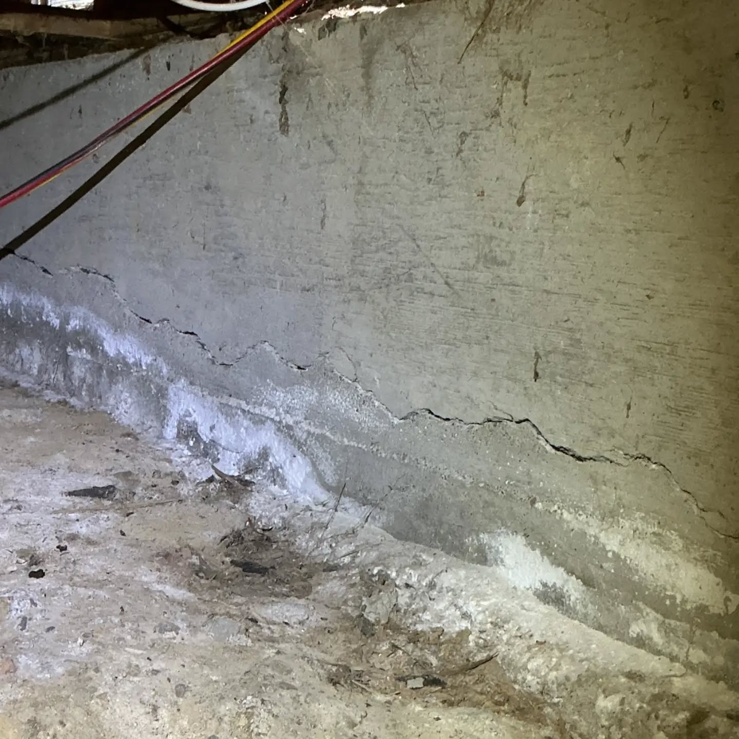 Defect of the Day: Horizontal Foundation Cracking
Not all concrete cracks deserve the same level of concern.
During this inspection, widespread horizontal cracking was observed along the foundation wall, including portions visible from within the crawlspace. Horizontal foundation-wall cracking can be associated with movement or lateral forces acting on the wall and deserves more attention than the minor shrinkage cracking commonly found in concrete.
A home inspection can identify and document the cracking, but determining its structural significance requires evaluation beyond the scope of a general home inspection. I recommended evaluation by a qualified foundation repair contractor to determine the extent of the issue and whether repairs are warranted.
The crawlspace isn't glamorous—but sometimes that's where some of the most important observations are hiding.
Vigilant Inspection
Engineered perfection for your property inspection!