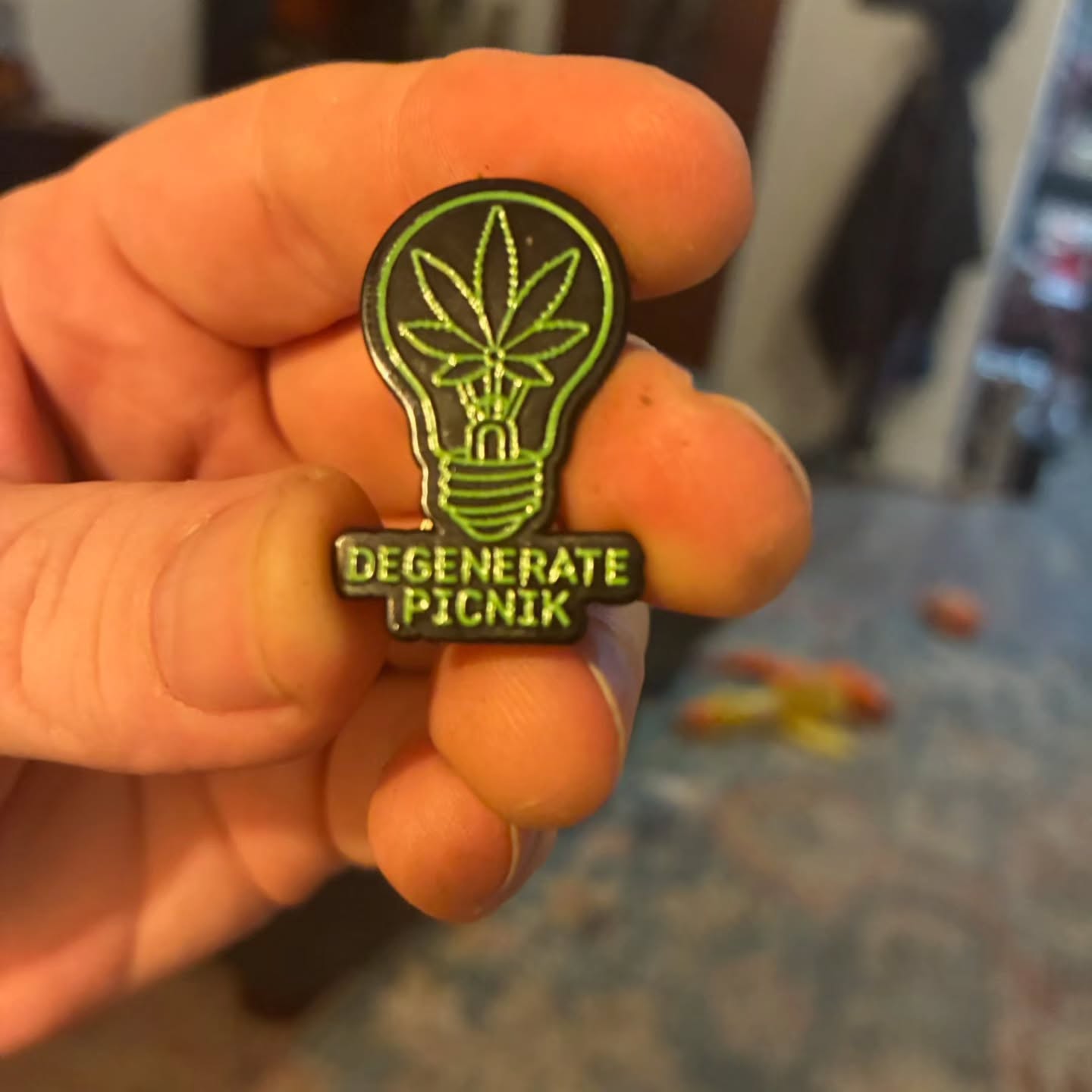 Cool surprise. @degenerate_picnik turned one of the designs I drew while back into pinback. 🤣 This is the first time any of my illustrations have been made into one. Sick!