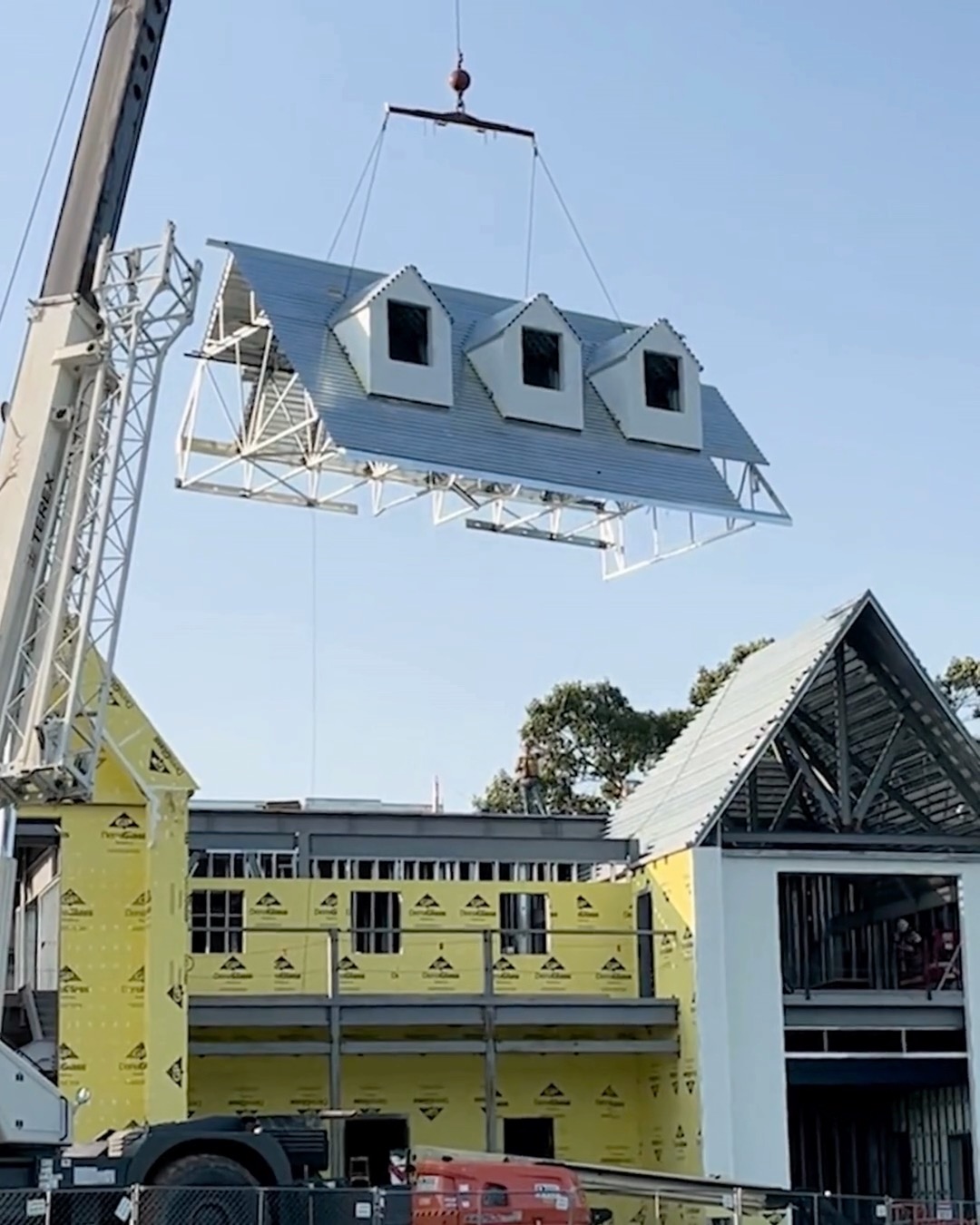 Sometimes the best way to build something onsite is to build it somewhere else first.
This dormer was framed and finished at the GCI shop, then transported to the jobsite and set into place by crane. Building sections like this in a controlled environment helps our crew work efficiently and gives us room to get the details right before it ever leaves the shop.
A lot of planning and teamwork goes into making the final crane pick look like the easy part.
No Excuses, Just Results
#GreenCountryInteriors #TeamGCI #Prefabrication #CommercialConstruction #BuiltRight