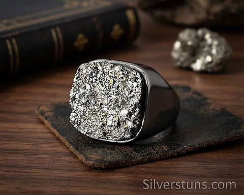 Natural Pyrite Cushion Ring – Solid Sterling Silver Men’s Jewelry
Unleash the raw energy of nature! ⚡✨ Check out our handcrafted statement ring featuring a stunning 15mm natural raw pyrite cushion stone, set securely in solid 925 sterling silver. Known as “Fool’s Gold,” raw pyrite offers an unmatched metallic sparkle and a bold, rugged look.
🔹 Material: Solid 925 Sterling Silver
🔹 Stone: Natural Raw Pyrite (15mm Cushion)
🔹 Weight: Approx. 9 to 12 grams
🔹 Sizes Available: US 4 to 14 (Custom sizing available)
Built for durability and designed to turn heads. Elevate your collection today—DM or visit Silverstuns.com to order yours! 🛒👇
#RawPyrite #PyriteRing #SterlingSilverRing #MensStatementRing #HandmadeJewelry