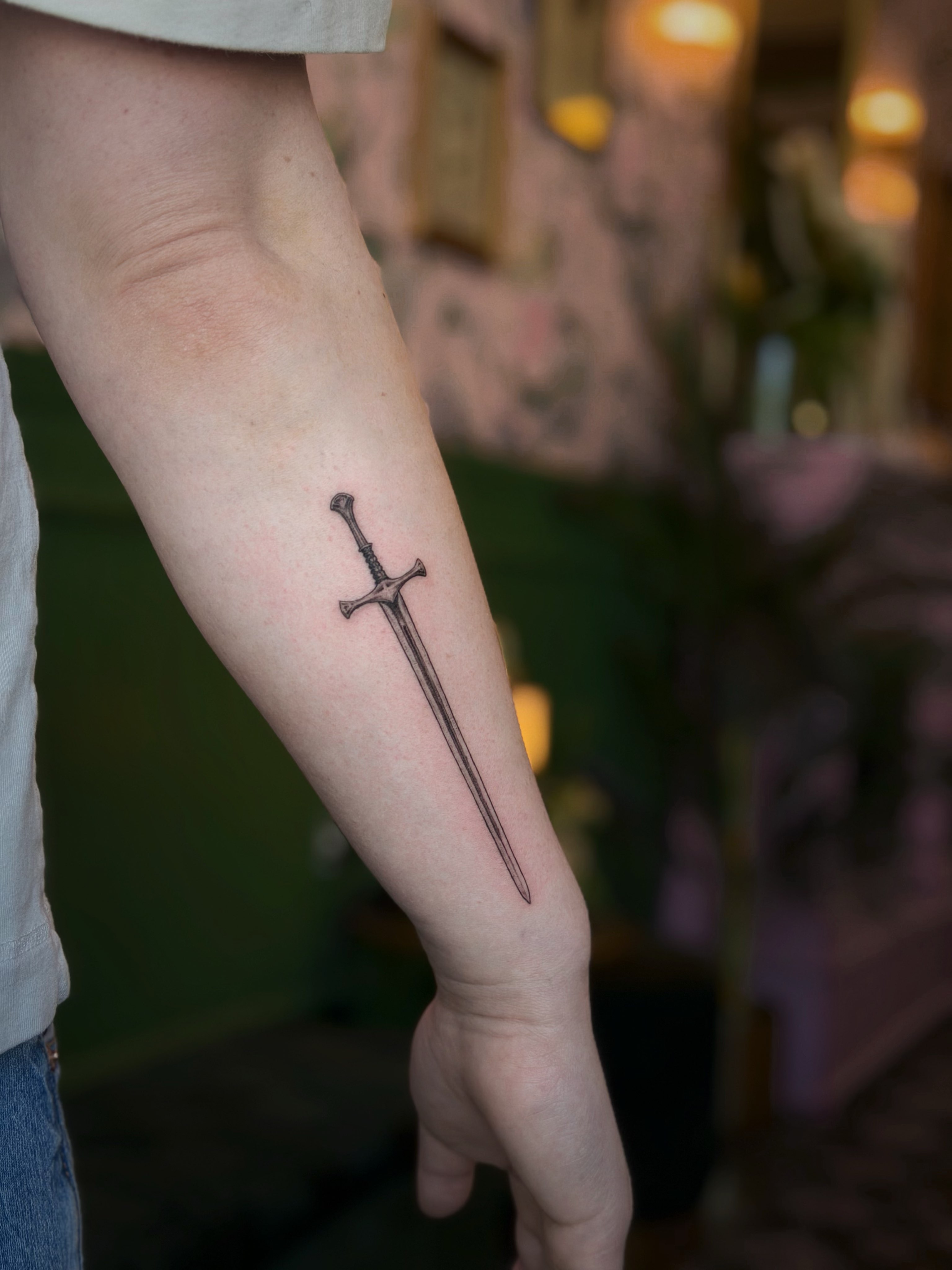 Beautiful sword by artists Stanley (@whitetattoo.ink ) ๐ก๏ธ Bool with Stanley through the link in our bio! ๐ฆ๐
.
.
.
#tattoo #sword #swordtattoo #blackandgreytattoo #finelinetattoos