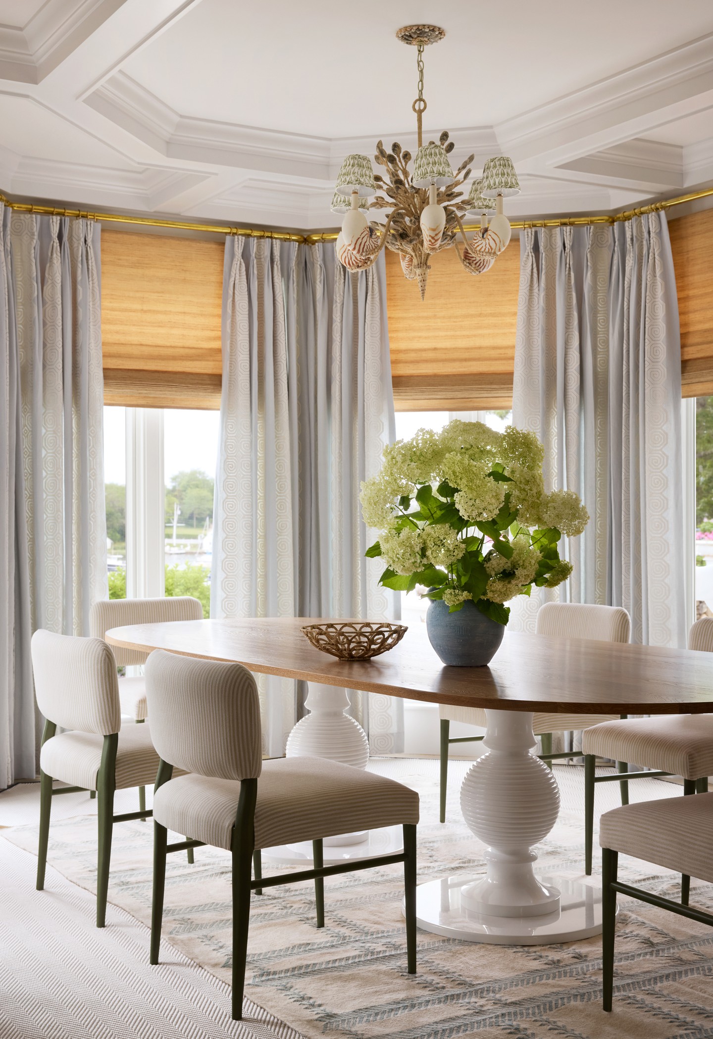 Each room in this renovation has a character all its own, beginning with the light-filled breakfast room and its beautifully detailed ceiling. Throughout the home, thoughtful millwork creates both distinction and continuity, from coffered ceilings and graceful arched openings to custom cabinetry, paneled walls, detailed moldings, and a statement fireplace surround. Every element was carefully crafted to complement the personality of its space while bringing the entire home together.
Interior Design: Ariel Okin
Photography: Donna Dotan