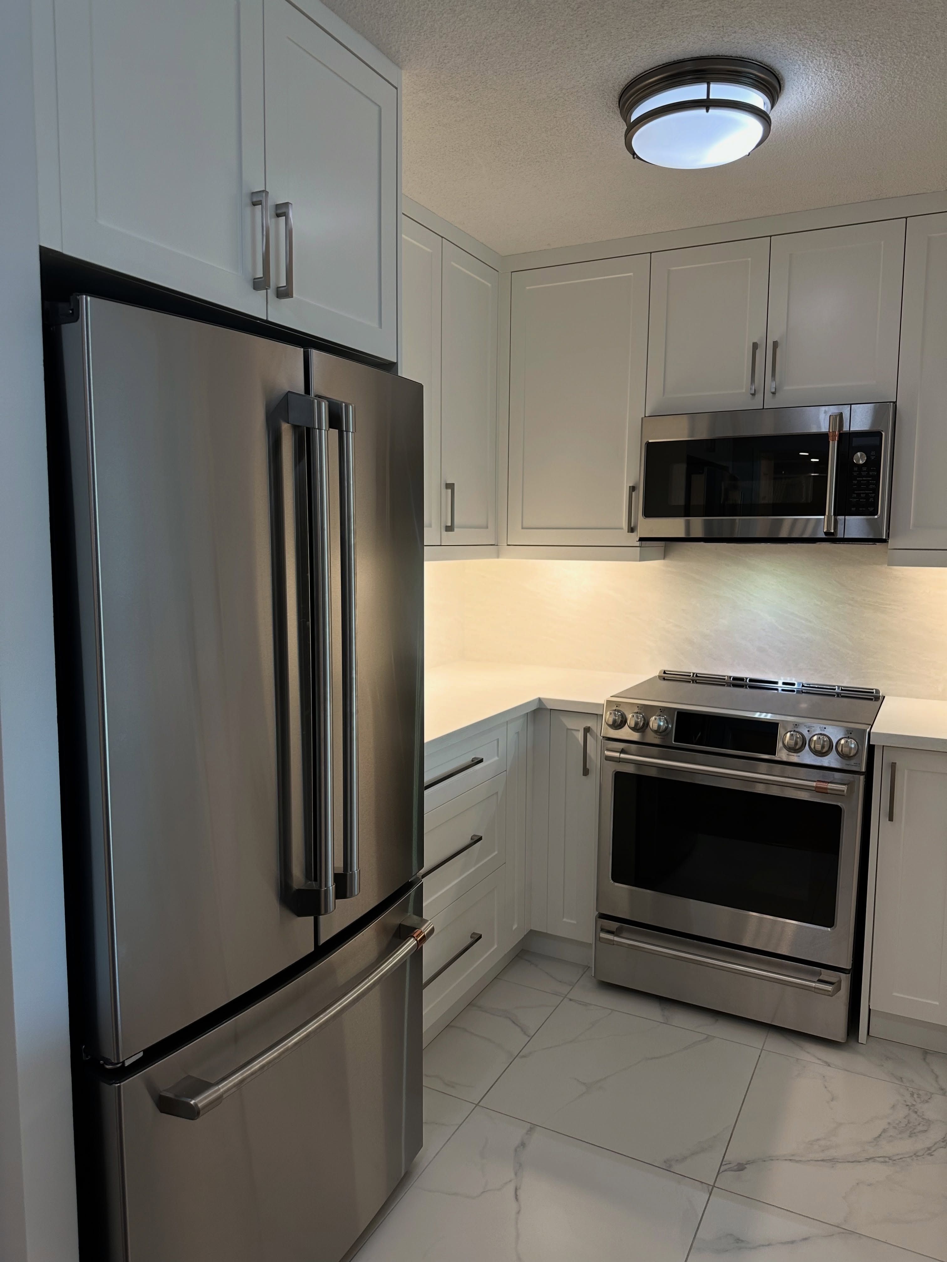 The BEFORE photos are at the end… and trust us, you’ll want to swipe all the way. 👀➡️
Three years ago, we renovated the bathroom in this Mississauga condo. Our client wanted to tackle the kitchen too, but instead of stretching the budget, we made a plan: finish the bathroom properly, prepare for the future, and come back when the time was right.
We even installed the kitchen flooring back then knowing exactly where this story was eventually headed.
Three years later, she called us back!
This time, it was about getting more out of every square foot — extending the cabinetry beyond the original kitchen, wrapping around the existing pillar, creating additional counter space, taking storage higher, working cabinetry around the bulkheads, and incorporating deep pot drawers, a spice pullout and beautiful lighting from Casa di Luce.
Small footprint. Much bigger function.
But the finished photos only tell half the story.
👉 Keep swiping until you reach the BEFORE photos to see just how much changed — then head back to our previous Reel for Rowan’s full walkthrough and transformation reveal.
And if you’re looking at your own kitchen thinking, “There has to be a better way to use this space…” — there probably is.
Visit purpleproperties.ca to explore more transformations, read our client testimonials and request your free renovation quote! ✨🏙️💟 #PurpleProperties #TransformingRealEstate
.
.
.
#TorontoCondos #KitchenReno #KitchenRemodel