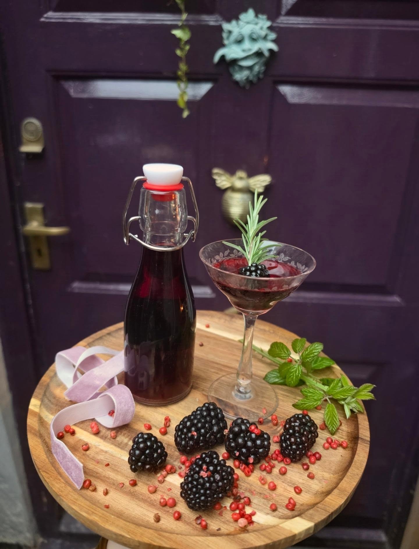 Blackberry & Pink Peppercorn Cassis ... I know, I know, technically speaking, there is no such thing as Blackberry Cassis. Cassis is made with blackcurrants ... But blackberry liqueur sounds a bit ordinary, for something that I wanted to become a little magical ...
So Blackberry & Pink Peppercorn Cassis it is ... Because somehow it sounds darker, a little more mysterious. Like something you might find written in an old Somerset recipe book in handwriting that nobody can quite decipher.
This particular bottle began its life six weeks ago, It has been sitting there patiently waiting its turn and today, it finally got its moment. I strained it, tasted it and adjusted the sweetness with a little extra caster sugar before bottling ... The results ... Dark, rich, intensely blackberry and with that tiny warmth from the pink peppercorns and more than worthy of its name 💜
This recipe can be found in my new Nature's Cocktail Cabinet section on my website (Website link in bio) x
#blackberries #natutureslarder