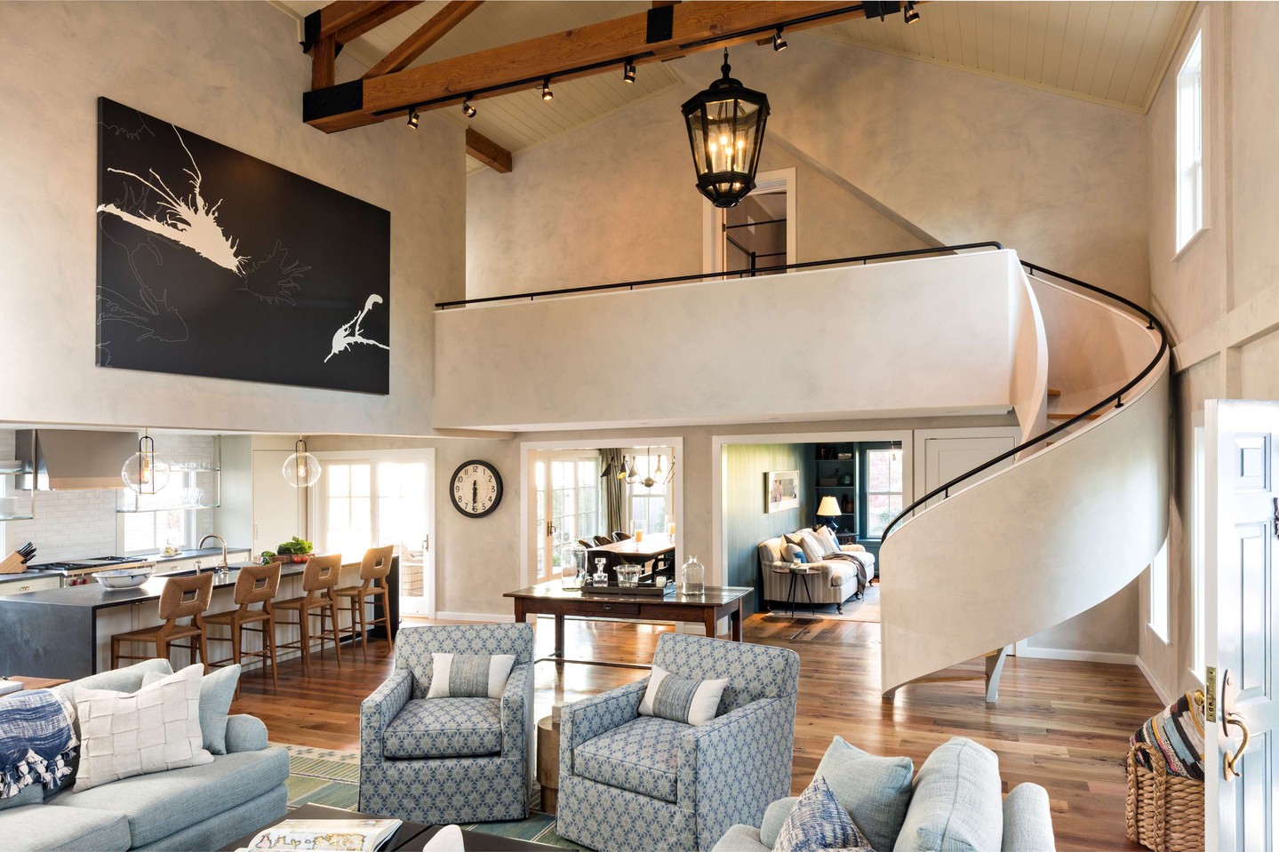 A striking before-and-after from this Cape Cod home renovation.
The transformation opened up the main living areas, introduced more natural light, and brought a cleaner, more cohesive feel throughout the home. A sculptural curved staircase now anchors the space, complemented by exposed timber beams, updated flooring, custom trim, a refreshed kitchen, and thoughtfully finished architectural details.
The result is a home that feels brighter and more refined while still retaining the character that made it unique.
Photography by Dan Cutrona
#CapeAssociates #CapeCod #CapeCodHomes #CapeCodRenovation #BeforeAndAfter #CustomHomeBuilder #CapeCodBuilder #HomeRenovation #Craftsmanship #CustomCarpentry #ArchitecturalDetails #CapeCodLiving #CoastalHomes
