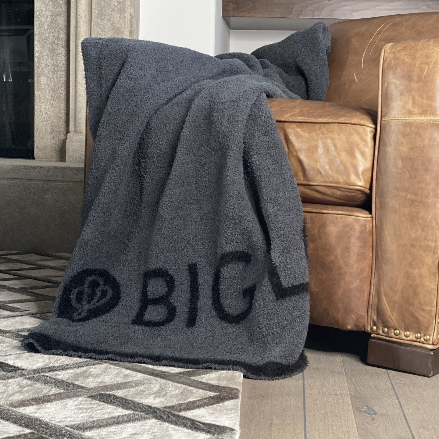 Dream BIG, snuggle bigger. ✨ Our DREAM | BIG LOViE blanket is medium-weight, ultra-soft microchenille with feather yarn in a gorgeous midnight charcoal — 48” x 72”. Anti-pilling and machine washable. Link in Bio #DreamBIG #CozyBlanket #HomeStyle #SnuggleSeason #TheQuarryShop
