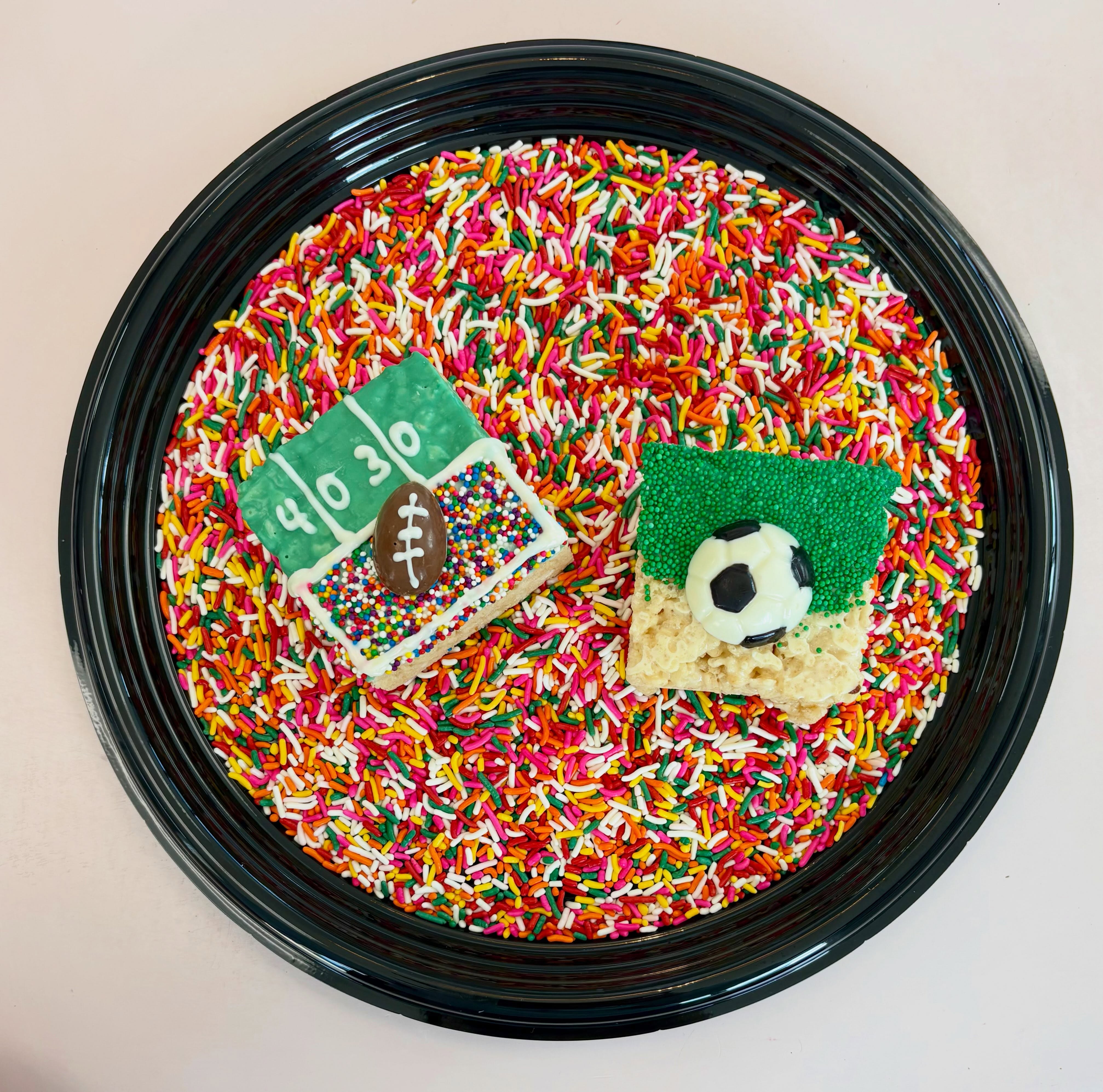 Sports themed brown butter Rice Krispie treats make a perfect after practice treat ⚽️🏈