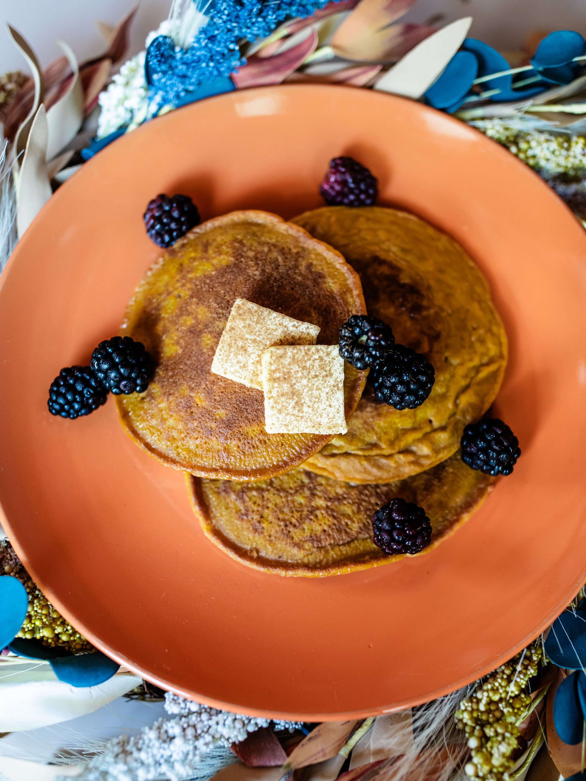 Pancakes with a hint of fall and loaded with antioxidants and fiber are my kind of breakfast! Introducing my Sweet Potato Pancakes that are sure to be a winner for the whole family! Freeze them for later or make them and eat them fresh! Either way, you can't go wrong! Give them a try!
Ingredients:
-2 cups of diced roasted sweet potatoes (skin on)
-1 cup of arrowroot flour
-2 tbsp of avocado oil
-2 eggs
-1/2 tsp of Ceylon cinnamon
-1 tsp of vanilla extract
-1/3 cup of oat milk
-1 organic banana
-1 cup of organic berries
-4 tbsp of grass fed butter
-4 tbsp of organic maple syrup
Directions:
Preheat your oven to 400Β° and then get to chopping up your purple sweet potatoes. Toss your sweet potatoes in the avocado oil and lay on a baking pan to bake for 30 minutes. Allow them to cool slightly and then toss them into the blender amongst the eggs, arrowroot flour, Ceylon cinnamon, vanilla extract and oat milk. Blend until smooth and then pour into frying pan and cook evenly on both sides at medium/ high heat. Top with grass fed butter, banana, berries and syrup and enjoy! π π₯
*Note: this recipe makes two servings.
#sweetpotato #pancakes #healthyfallrecipes #livehealthywithlaura