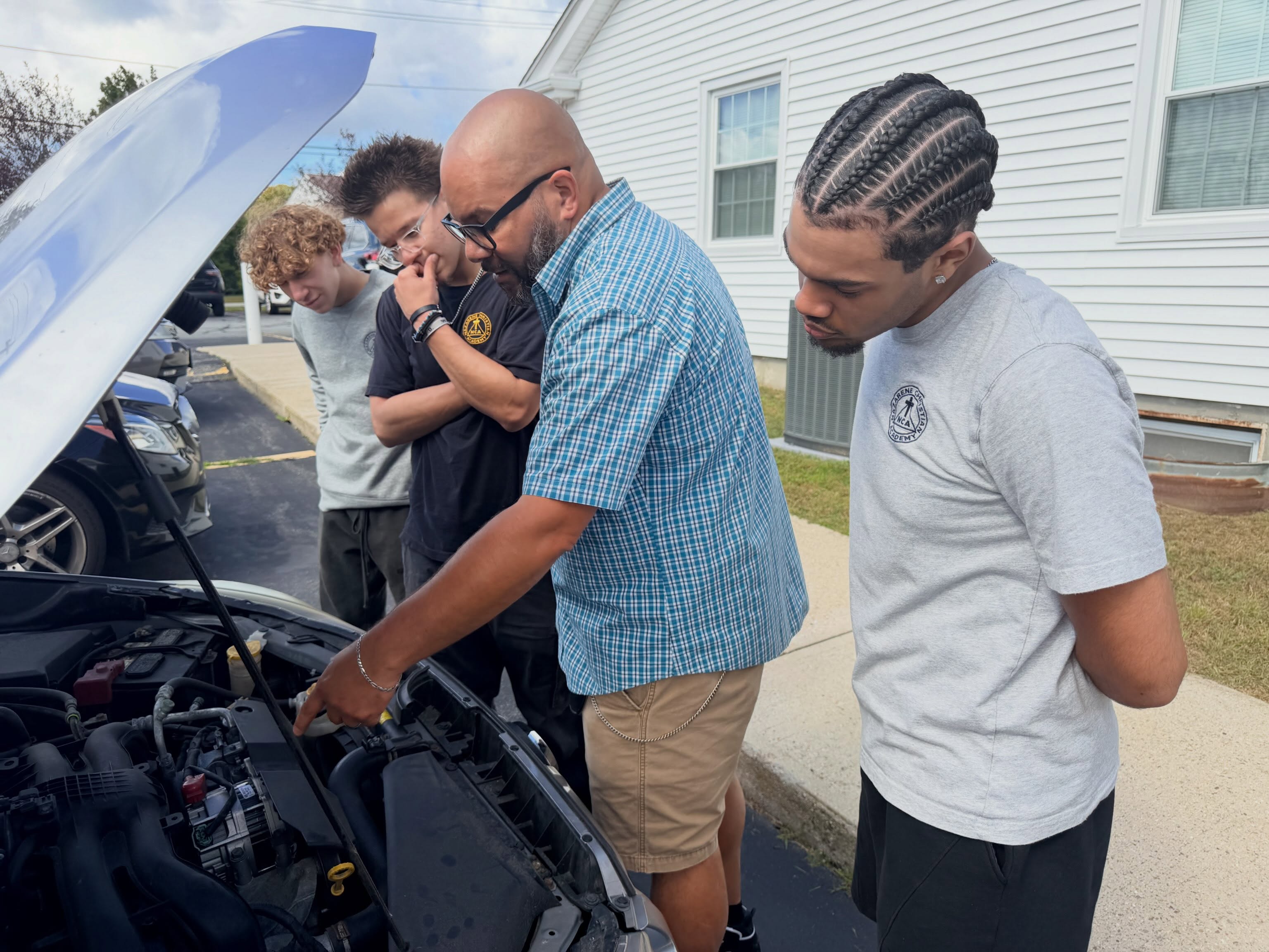 Learning automotive maintenance in Life Skills class. 🚘