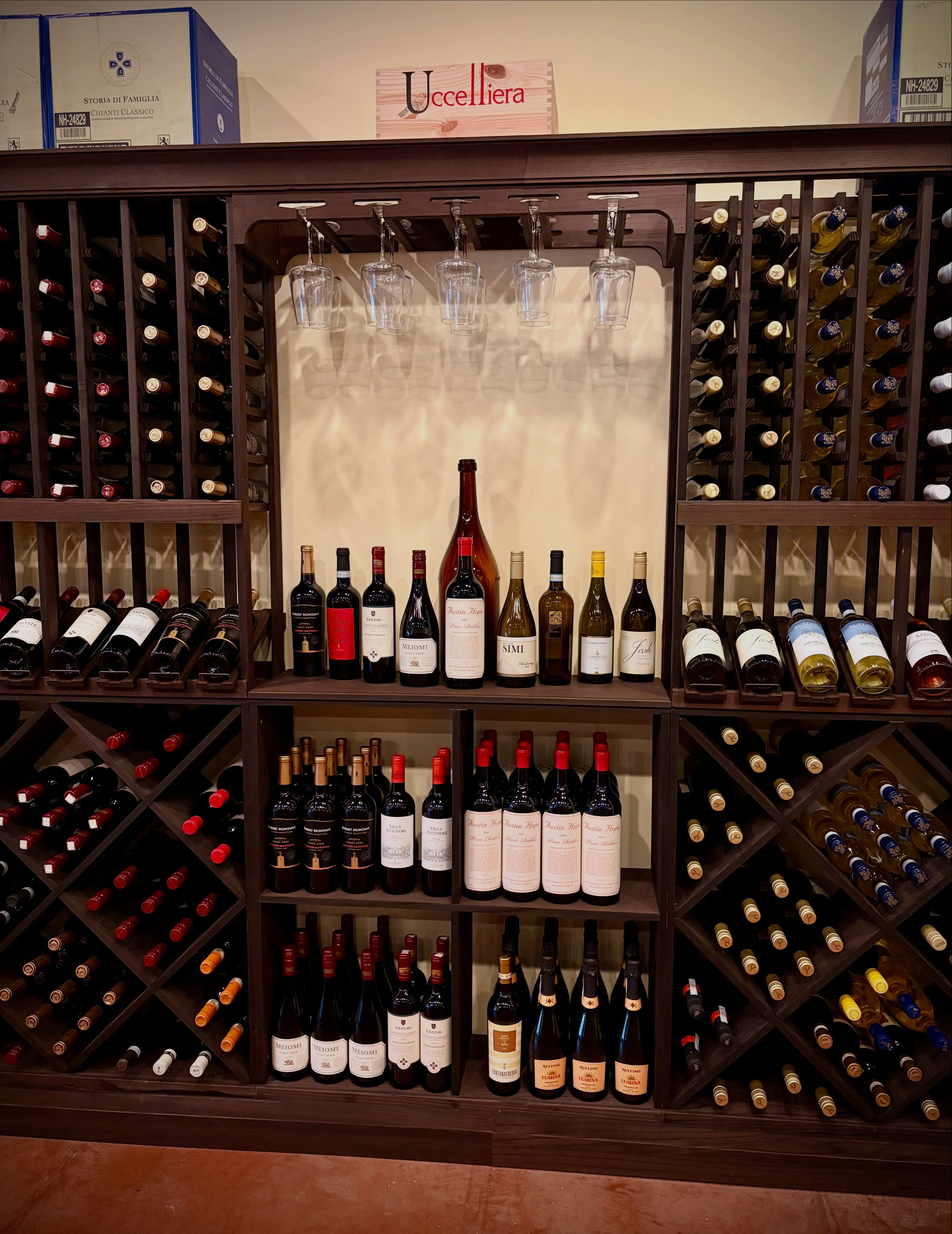Come enjoy a glass of wine and browse our freshly stocked wine rack!