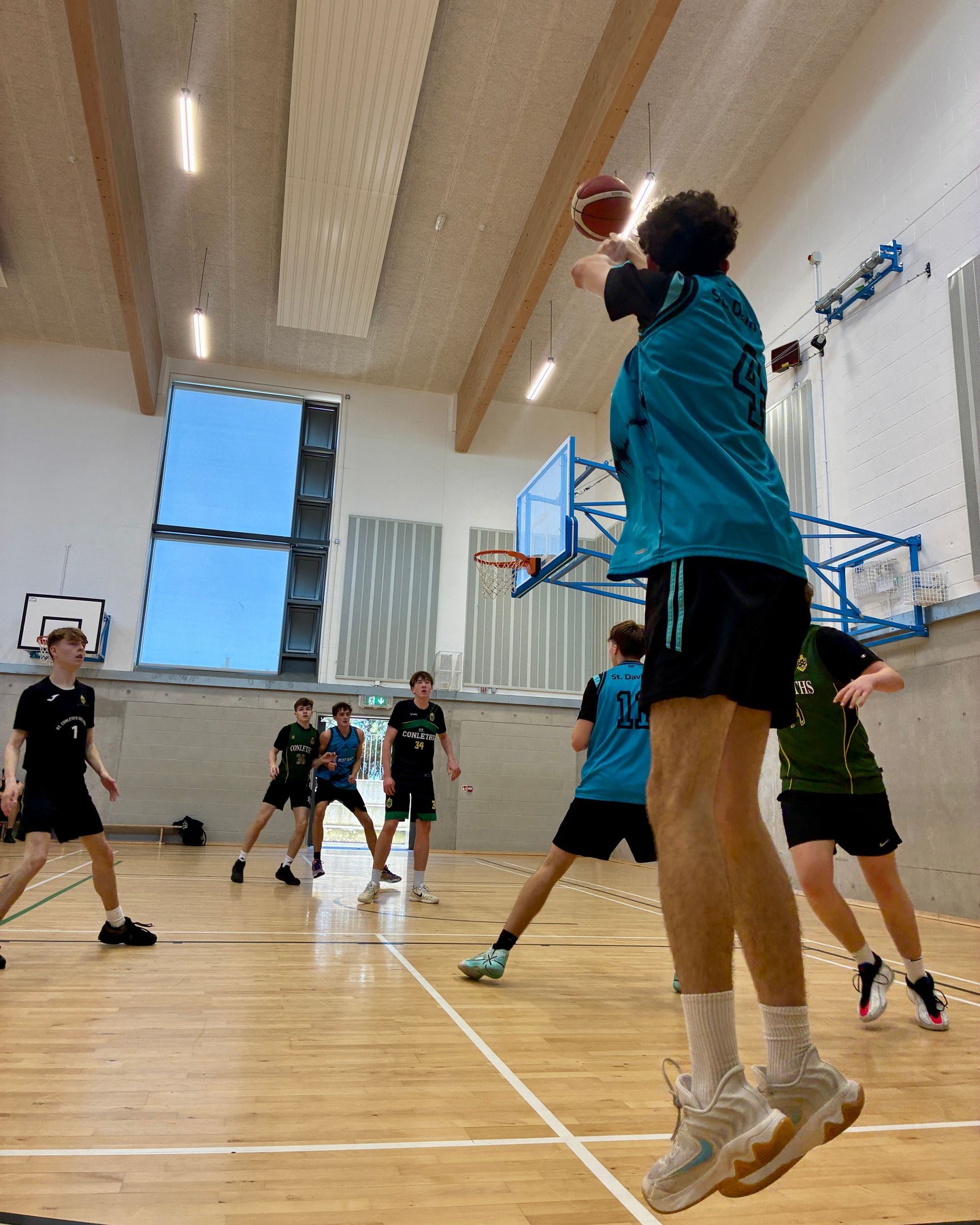 On Tuesday, our Under 19s and Under 16s boys' basketball teams took on St Conleth's College in a home fixture in Greystones. Our Under 16s played a strong match but ultimately lost in a very close game.
The Under 19s dominated from the beginning, with a particularly impressive performance delivered by team captain, Chester. The final score was 82-46 to St David’s, earning the boys an impressive win to really kick start their season.
A huge thank you to St Conleth's for their competitiveness and sportsmanship across both games on their visit to our school 🏀