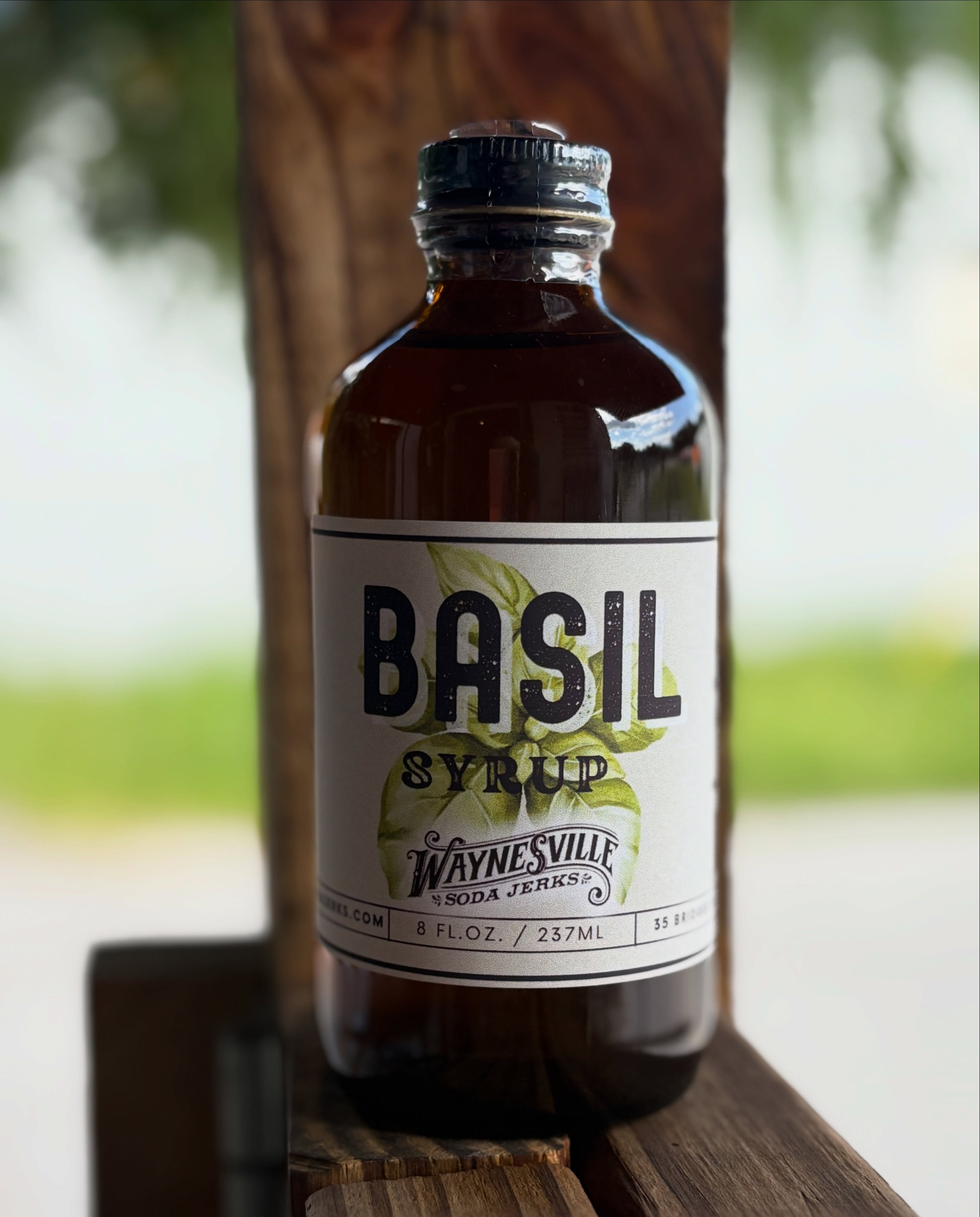 🌿 Meet our Basil Syrup: fresh, herbaceous, and bottled with care right here in Waynesville. 🌿
Every leaf of basil we use is sourced from the @biltmoreestate, hydroponically grown in their greenhouse gardens. Biltmore is also who we partner with for our private label Blueberry Basil Soda, which can be found at select locations throughout the Estate. 💚
So what can you do with it? Just about anything:
🍋 Stir it into lemonade or iced tea for a garden-fresh twist
🫧 Mix w/ sparkling water for a simple homemade soda
🍸 Shake up a basil gimlet, basil smash, or a bright mocktail
🍓 Pair it w/ strawberries, peaches, or watermelon
🍨 Drizzle over vanilla ice cream or a fresh fruit salad
🥗 Whisk into a vinaigrette for a sweet, herby dressing
And here’s the big news: our craft syrups are now available on our online store! Shop them alongside our sodas, wearables, @whollygoatsoap soaps and candles, and more, all from the comfort of home. Link in our social media profiles. 🛒📦
Now we want to hear from you! What flavor would you love to see next in our syrup lineup? Drop your ideas in the comments… 👇
#WaynesvilleSodaJerks #CraftSyrups #BiltmoreEstate #ShopLocal #WNC