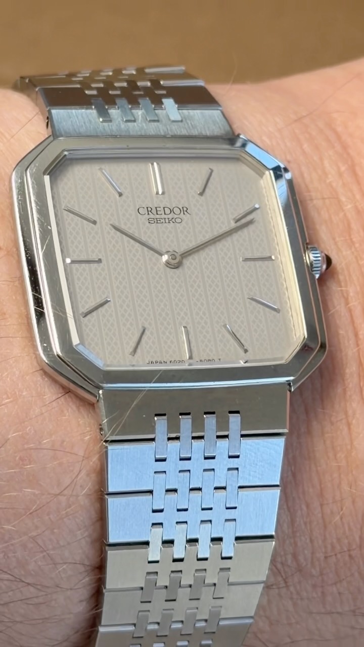 Available now at TEMPO PRIMA, An early Credor, dating to September 1979.
Credor was Seiko’s high end watch line, and this 6020-5070 is a great example of the understated Japanese design language of the period.
An exceptionally thin, angular stainless steel case, integrated bracelet and textured silver dial give it a very distinctive late 1970s look. The dial has a subtle repeating texture that changes with the light, while the applied markers and finely finished hands keep the overall design remarkably clean.
This example has been particularly well preserved and remains completely original, including the dial, hands, case, crown, crystal and integrated bracelet.
And perhaps most unusually, it comes as a genuine complete set, original inner and outer boxes, warranty documentation, instruction booklet and even the original sales receipt from 1979.
The original bracelet measures approximately 20cm overall, making this an unusually accommodating example of a vintage integrated-bracelet watch.
A fascinating piece of early Japanese luxury watchmaking, and a reminder that Seiko was producing some remarkably refined watches long before Credor became widely known outside Japan.
Available now at TEMPO PRIMA.
#SeikoCredor #Credor #Seiko