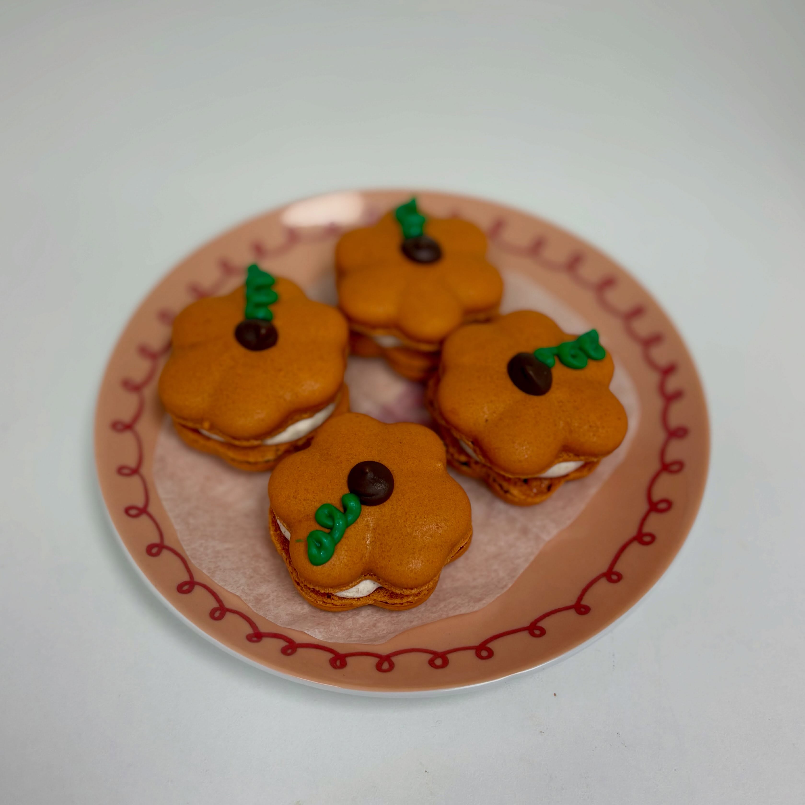 Delicate but full of flavor, these caramel pumpkin spice macaron are a perfect treat.