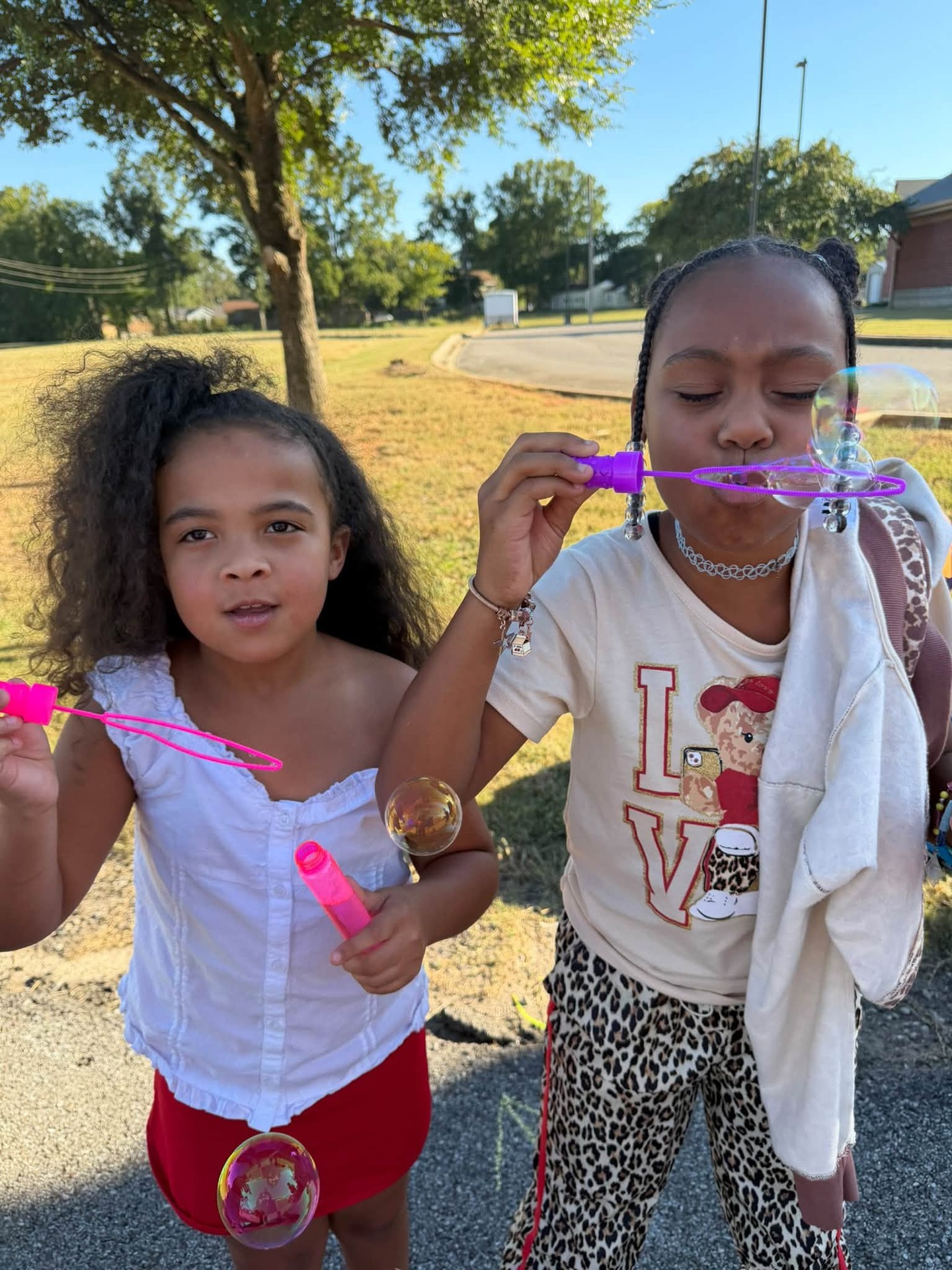 Bubbles and sunshine after school at the 3rd Street Club. Maybe adults should go outside and blow bubbles after work too? 😁