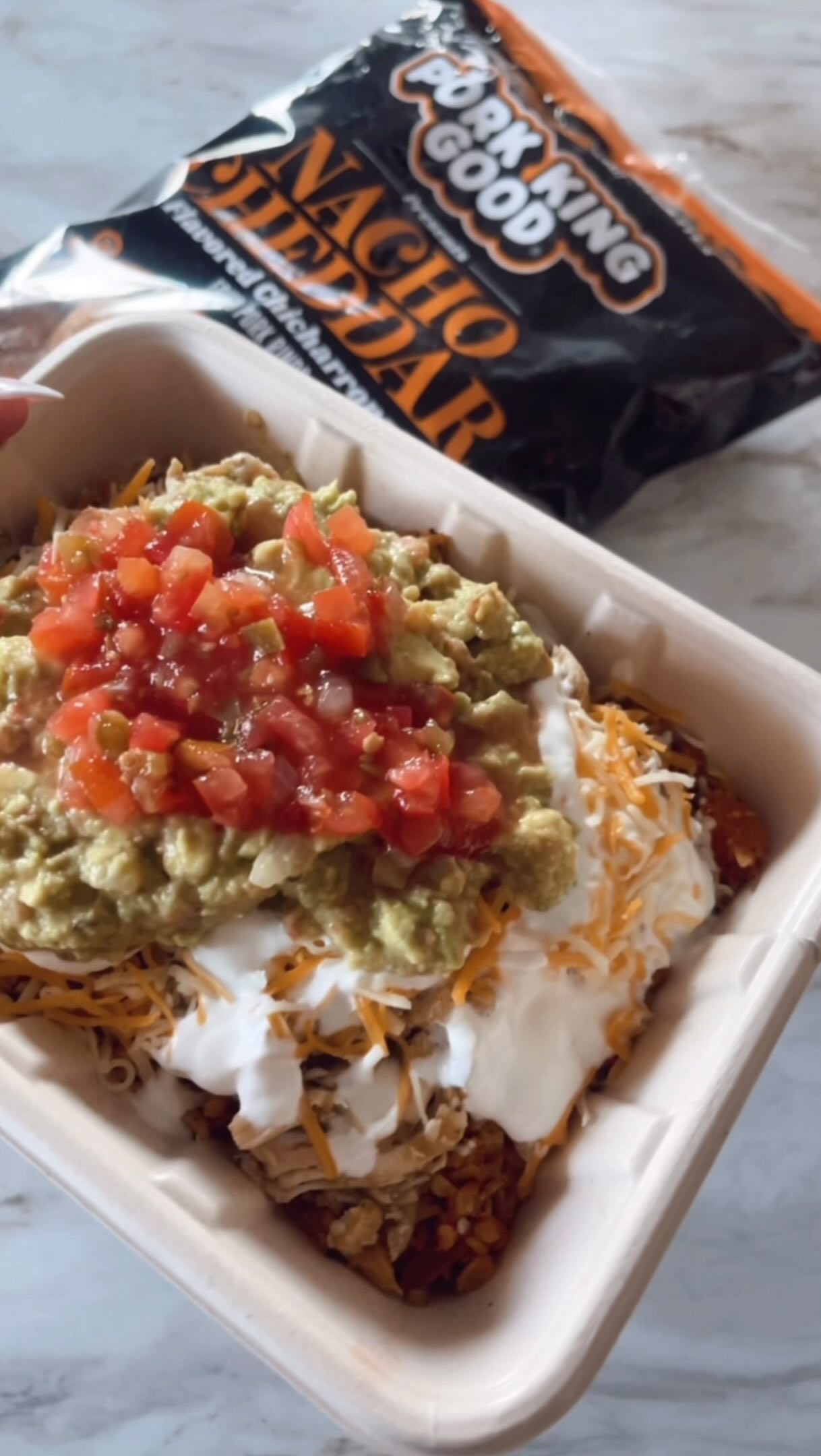 ✨TRADER JOE’S BURRITO BOWL✨low-carb high-protein👇🏼 recipe below
This easy keto-friendly burrito bowl has been a @traderjoes staple of mine for YEARS!
INGREDIENTS:
- @traderjoes Spicy Mexican-Style Riced Cauliflower
- @traderjoes Salsa Verde Pulled Chicken
- shredded cheese
- sour cream (plus lime juice + splash of cream to make a crema)
- guacamole
- fresh salsa
- pork rinds for dipping (the @porkkinggood Nacho Cheddar are my fav)
DIRECTIONS:
1) Sauté the riced cauliflower in a skillet until all the liquid cooks off and add to a bowl.
2) Then heat up the salsa verde chicken in the same skillet and then add it over the cauliflower rice.
3) Load up your bowl with shredded cheese, crema, tons of guac, and fresh salsa.
4) Then use the pork rinds as your chips for the BEST giant crunchy bites. ENJOY!
Save this for your next Chipotle craving and follow @conteketo for more easy low carb meals! #ConteKeto #Keto #HighProtein #BurritoBowl #TraderJoesHack