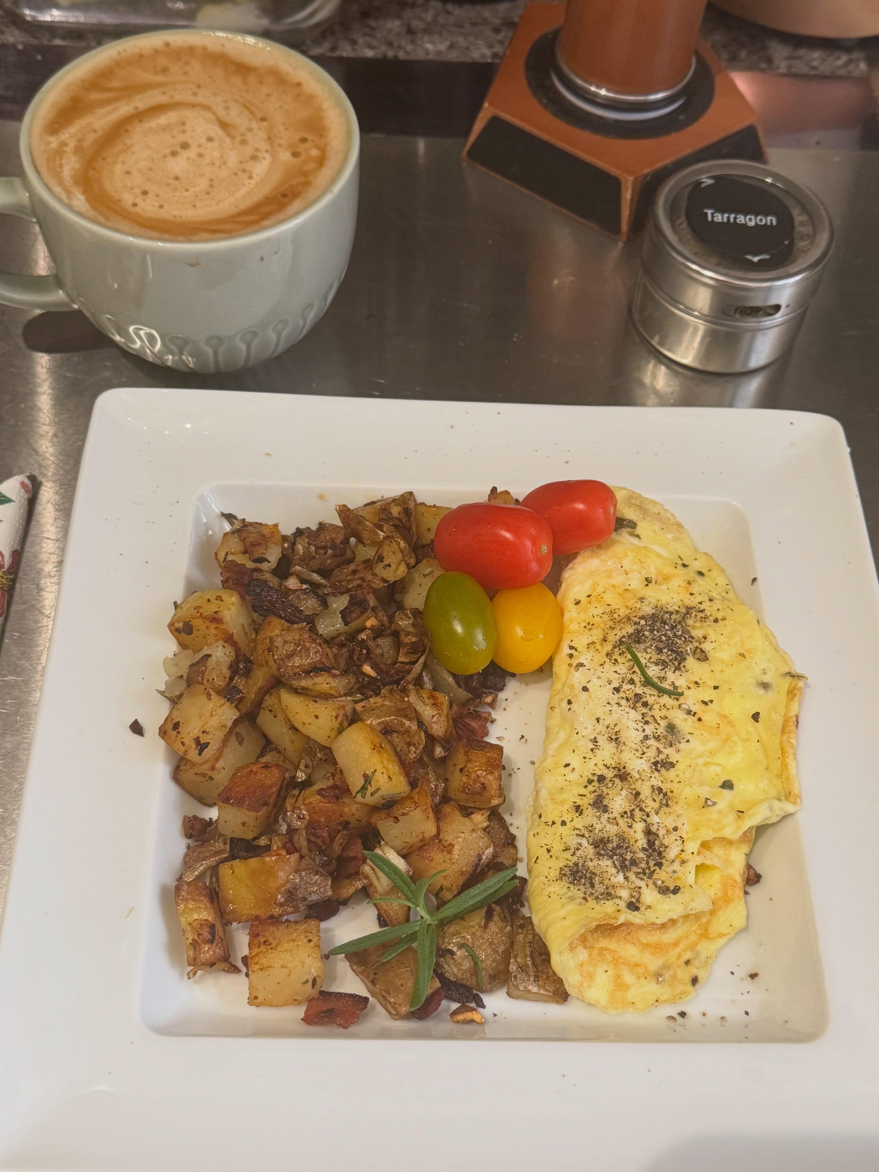 Continuing my farmers market produce theme, this morning’s breakfast was farm-fresh eggs, beaten with a little sea salt and half-and-half, fresh chopped tarragon, and unsalted butter.
But the main event was one of my favorite dishes: hash browns—the way my dad made them.
When I was a little boy, my dad would make these for me at 5 o’clock in the morning before I headed out on my paper route. He made them pretty much the same way I still make them today.
Over the years, I’ve updated his recipe a little—going with nitrate-free bacon, unsalted butter and using fresh rosemary from the plant growing in my kitchen window. Dad would have used powdered rosemary and bacon fat from his ‘bacon fat can’ which was simply the product of the time and what we had in the kitchen.
And then there are the sweet onions.
My mom was from the South, and she loved sweet onions—especially Vidalia onions from Georgia. They became one of my favorites, too, so using a Vidalia here feels like bringing a little bit of both my parents into the dish.
A leftover baked russet potato, cubed
A couple of slices of nitrate-free bacon
Half a Vidalia onion
Five cloves of garlic
A branch of fresh rosemary from my kitchen window
Aleppo pepper and cumin
Sea salt
And a bit of extra bacon fat from the jar
I start by frying the bacon, then remove it from the pan, leaving that wonderful bacon fat behind.
In go the Vidalia onions, sautéed until translucent and just beginning to caramelize, followed by the chopped garlic.
Then I add the potatoes, bacon, fresh rosemary, Aleppo pepper, cumin, and a generous sprinkle of sea salt, everything cooks for about 15 minutes, turning and moving the potatoes around the pan until they’re wonderfully crisp and browned on all sides.
A quick, soft omelette from those farm-fresh eggs, and breakfast is ready.
My dad called it “the breakfast of champions.”
And I suppose it was. It certainly got a little boy through two early-morning paper routes and off to school with a full stomach.
All these years later, I’m still making it his way—just updated a little for my own kitchen.
#breakfastofchampions💪 #homemadehashbrowns #farmersmarket #homecooking #childhoodmemories