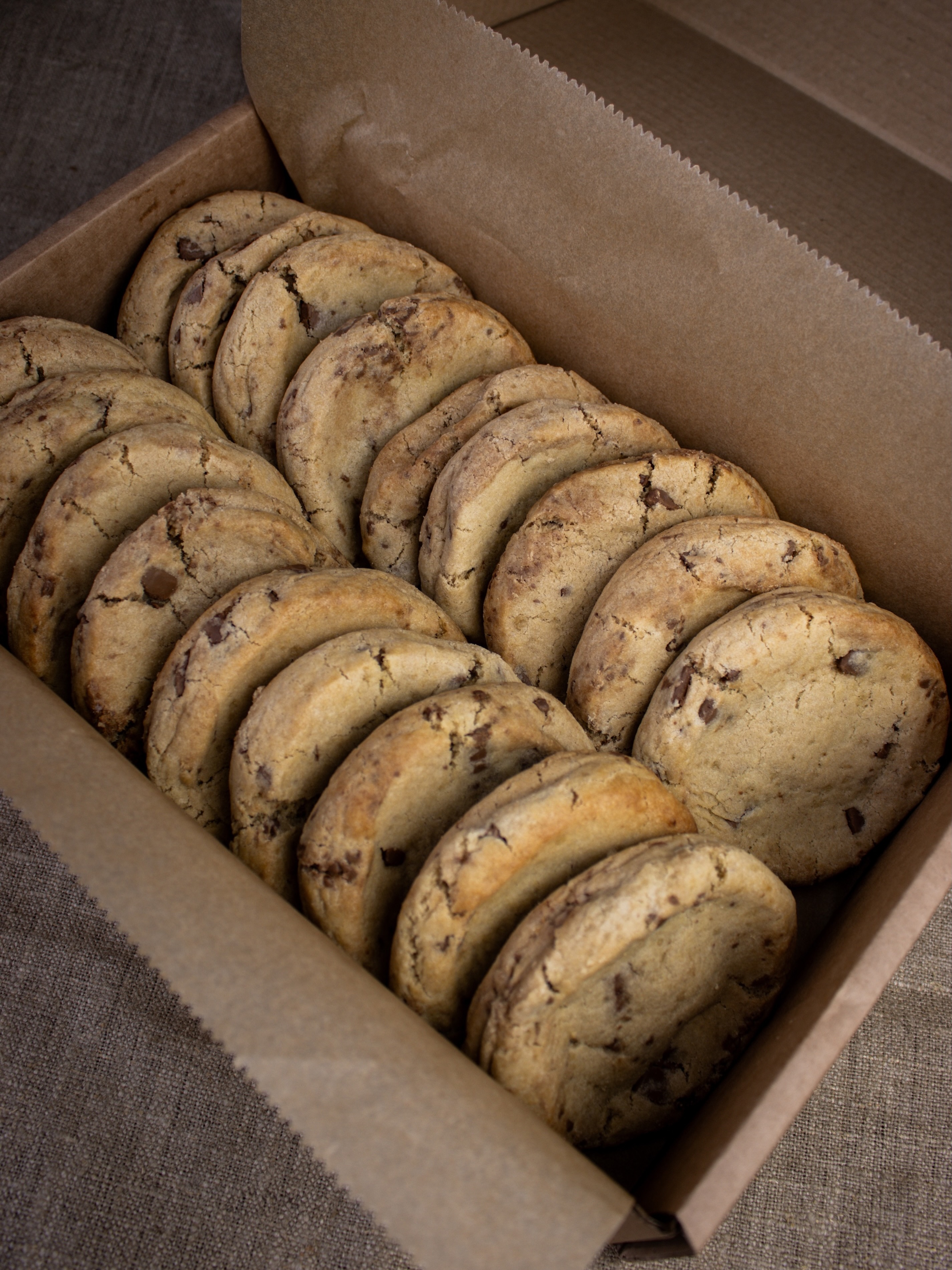 We love coming up with new flavours - seasonal ones in particular. We find it a really good excuse to try something a bit different and give your counter a change everyone once in a while.
But for all the experimenting, there’s really nothing quite like a classic. And our signature Milk Chocolate Chip Gourmet Cookie is definitely a classic: wonderfully generous and loaded with plenty of Belgian milk chocolate chunks.
Sometimes you don’t need to reinvent the cookie!