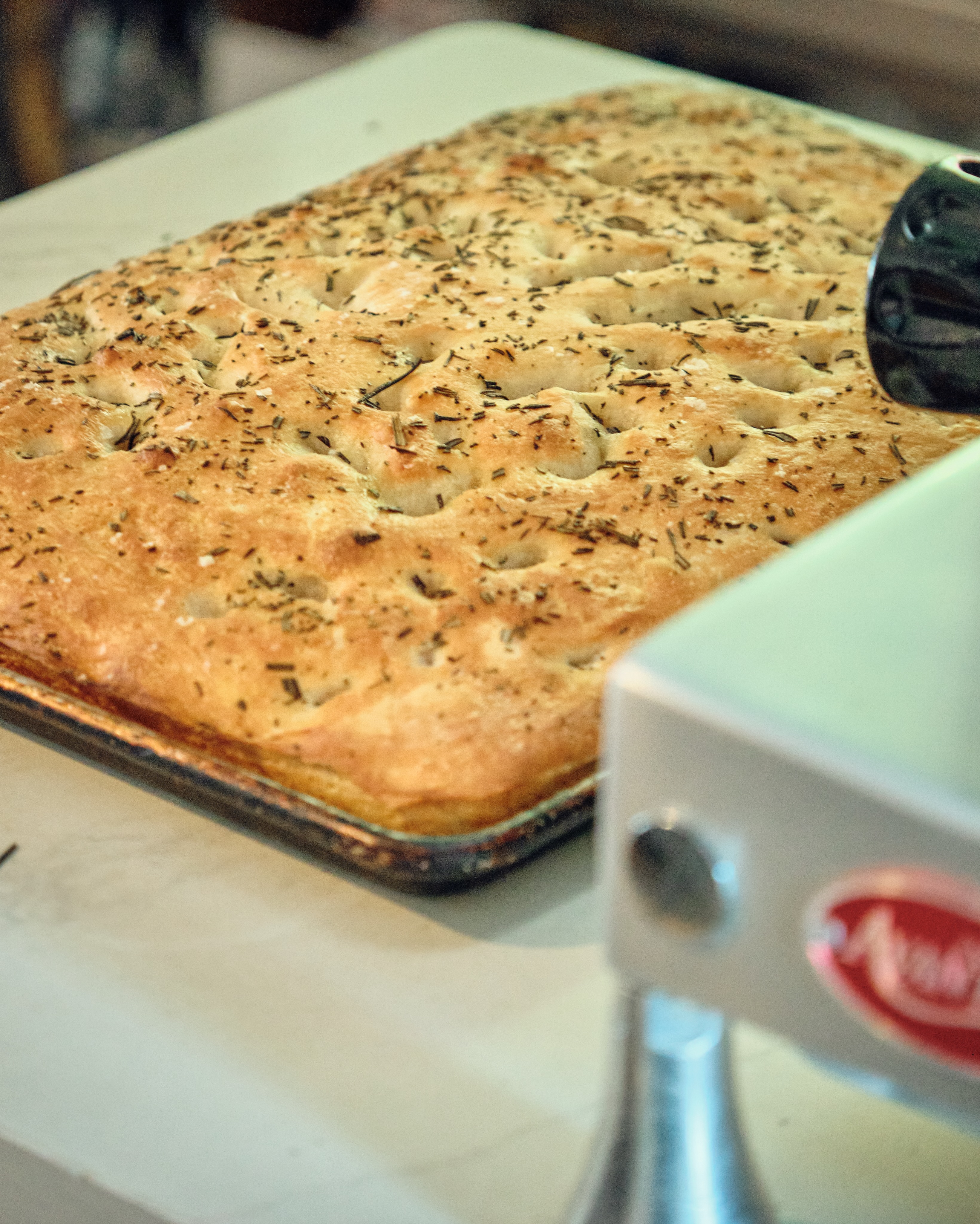 Fresh from the oven, every day.
At Cafe Med, our focaccia is made fresh daily, golden, airy, fragrant with herbs, and ready to begin your meal the Italian way.
Simple ingredients, timeless tradition, and that first warm bite you never forget.