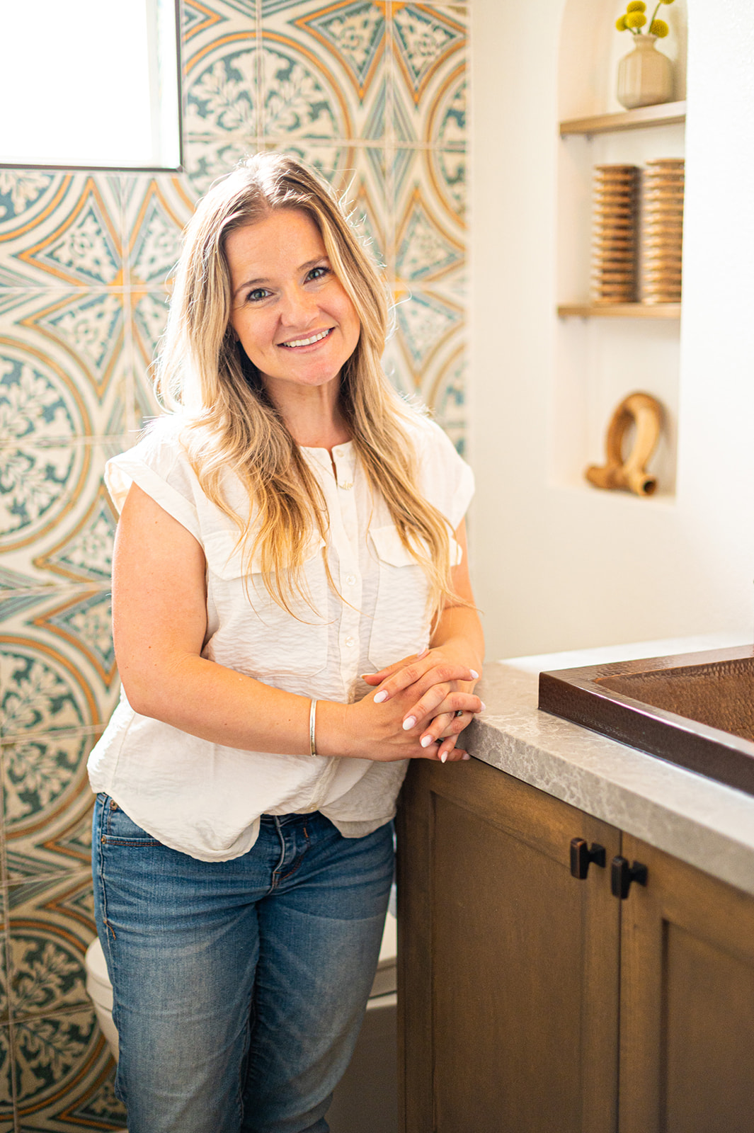 Hi, I'm Kara 👋🏼
The principal designer, contractor, business owner, and professional problem solver behind KNC Design Group.
I started KNC because I love creating beautiful spaces, but somewhere along the way I realized I love figuring out how to bring that beauty to life just as much.
These days, you'll usually find me bouncing between design meetings, job sites, material selections, construction schedules, and all of the little decisions in between.
Outside of work, I'm a wife, mom of two of the best kids in the world, and can often find me at a spa.
So whether you've been here for years or you're new around here— I'm super happy you're here.