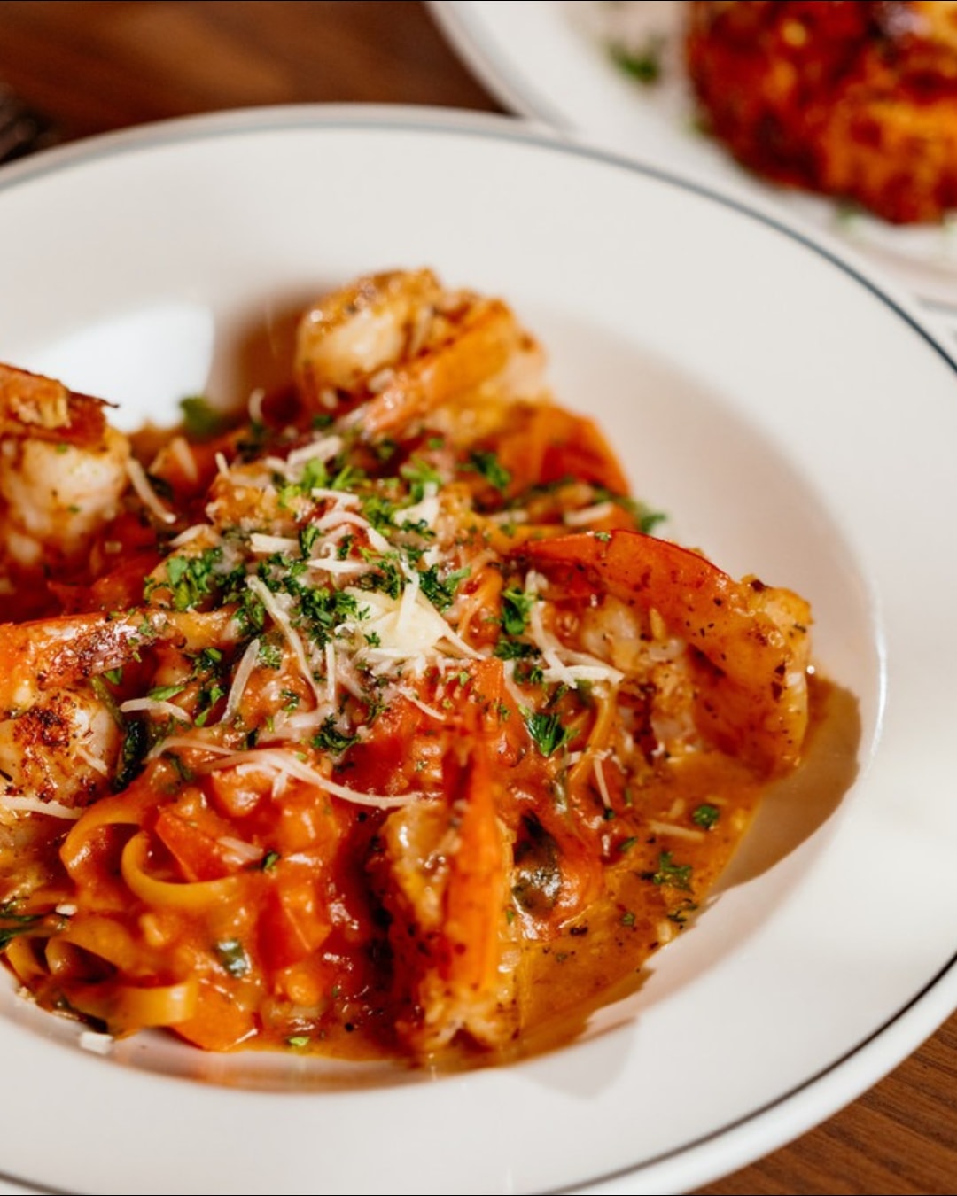 Pasta night has a nice ring to it. Especially when prawns, fresh herbs, and a rich, rosy sauce are involved.