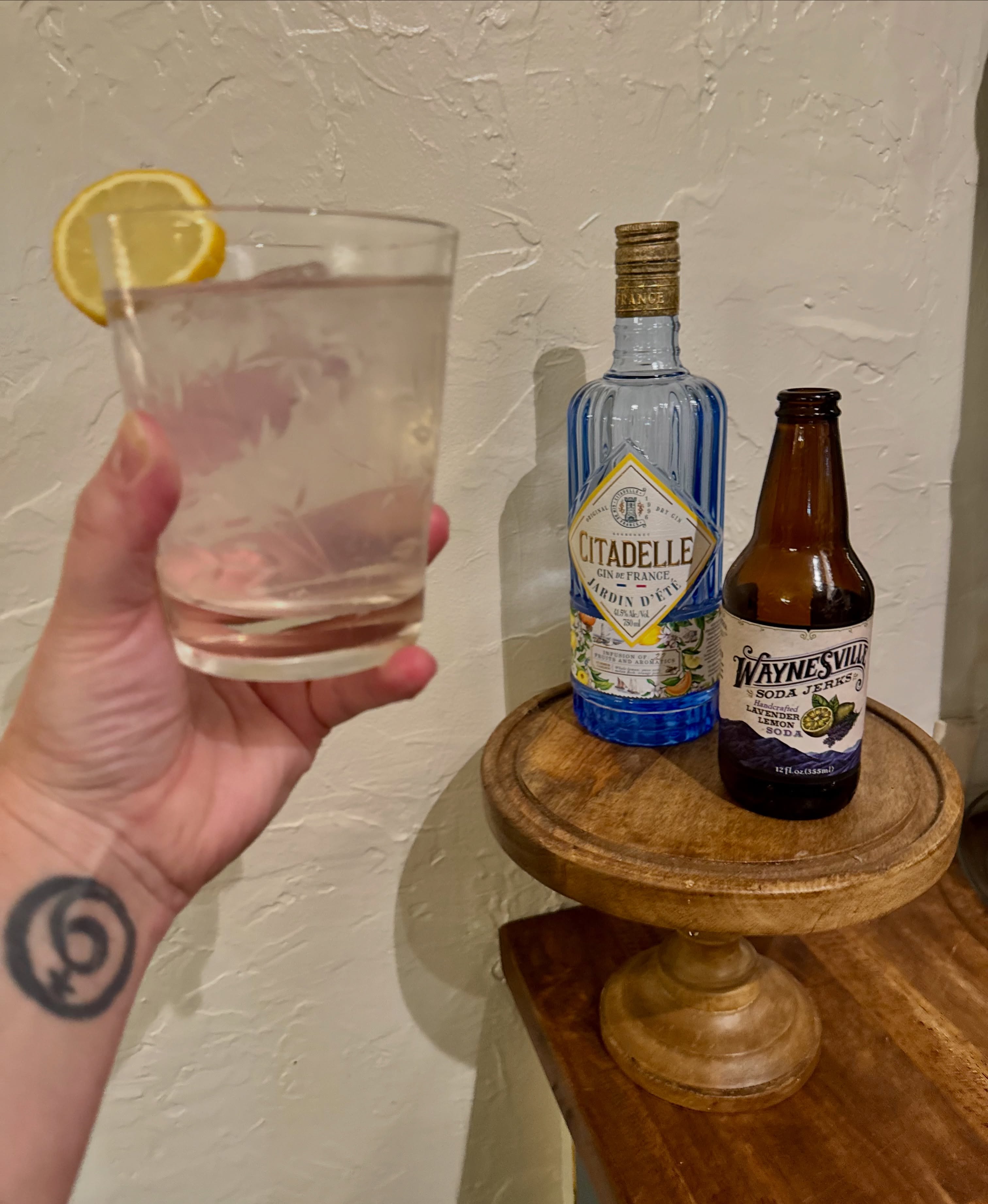 Bar-quality cocktail? You’re just a Soda Jerk away. 🍋💜
Our “Jerk” Megan grabbed a bottle of our Lavender Lemon Soda over the weekend and added a splash of gin. Bright citrus, a soft floral finish, and just enough fizz to keep everything refreshing. Just pour and sip! We do the hard work for you with our handcrafted sodas.
That’s the beauty of real, simple ingredients. Our sodas are made to stand on their own, but they also make the easiest mixers for bar-quality cocktails (or mocktails!) right at home. 🍸
Stock up for your home bar this week. We’re open 10 AM to 6 PM today through Saturday, so swing by and see us before the Main Street Fall Block Party kicks off this evening! 🍂
📍 35 Bridges Street in Waynesville, NC
#waynesvillesodajerks #lavenderlemon #sodacocktails #shoplocal #waynesvillenc