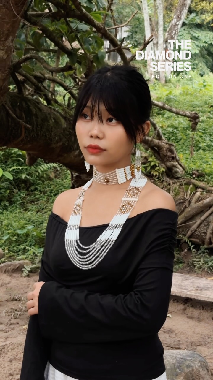 The diamond motif in a palette of ivory white and honey gold, bringing a subtle warmth to the geometric design.
Featuring the White Gold Diamond Motif Necklace with matching earrings, paired with its coordinating choker.
The Diamond Series
Edition One