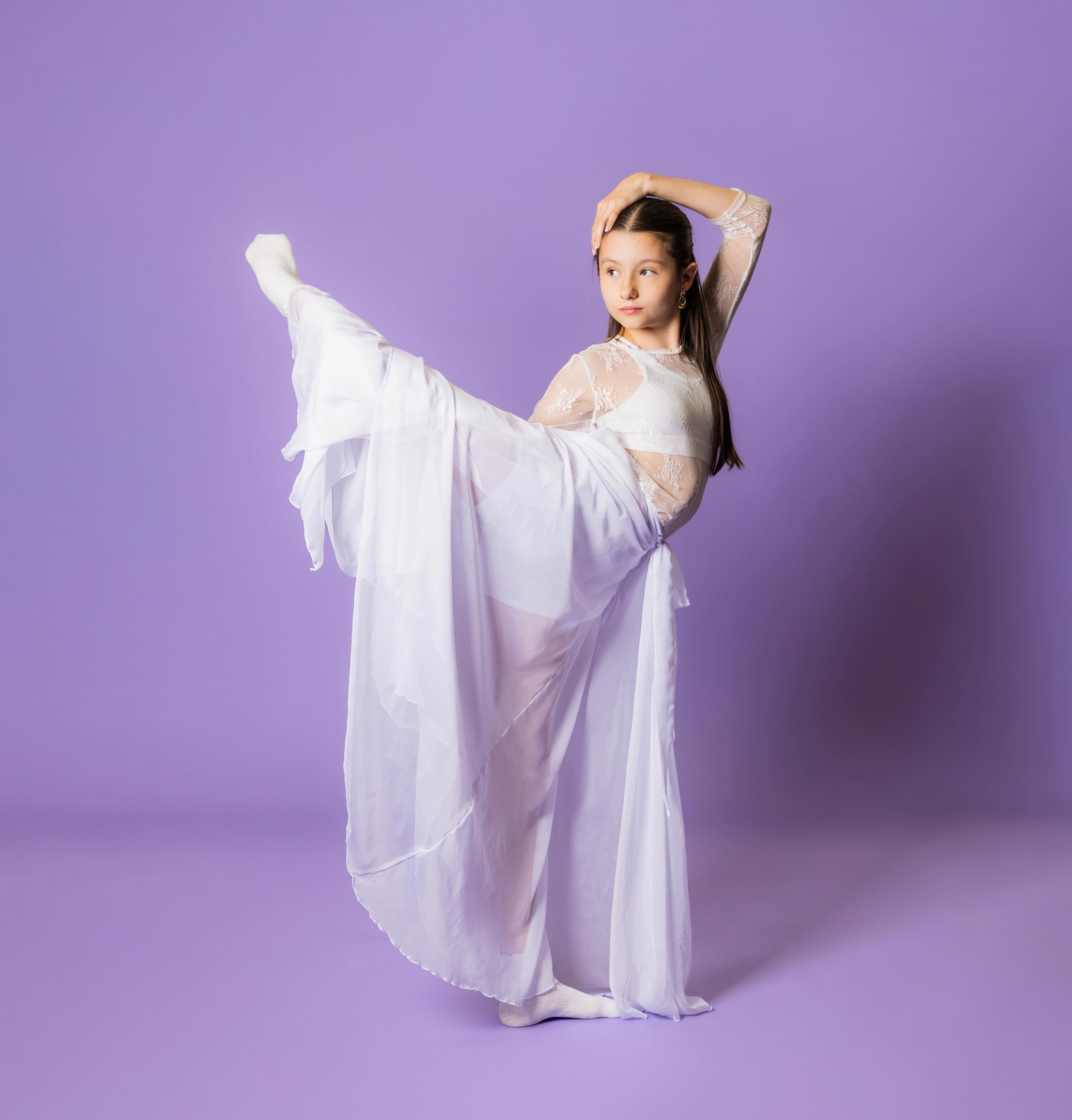 Happy Friday! We hope you are enjoying this beautiful day!! We wanted to share another stunning shot by @nataliereyvisuals of our beautiful Radiate dancer, Camille! 💜✨