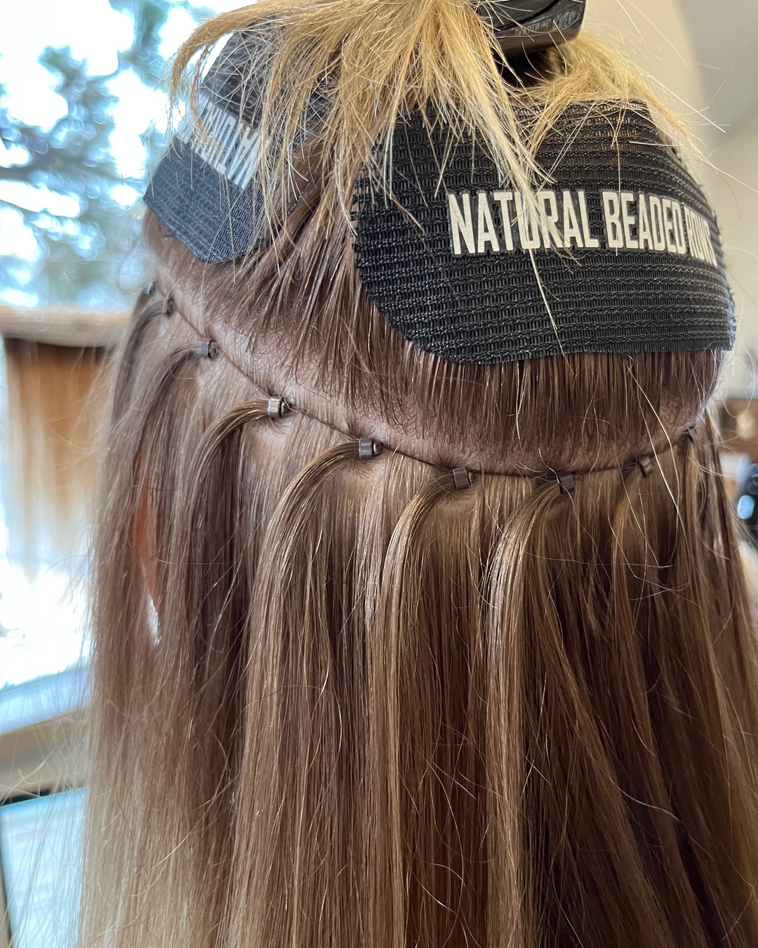The secret to our flawless extensions? It’s not just our Wild Indie Genius Wefts — it’s the Natural Beaded Rows (NBR®) foundation. Learn how this method changed our extension game and why clients keep coming back. Link in Bio #SeamlessExtensions #NBR #WildIndie #HairTransformation #DenverHair